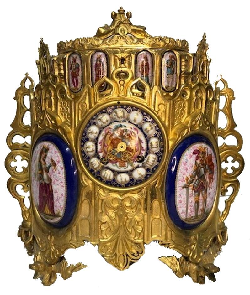This rare Renaissance Revival garniture, consisting of a clock and pair of boxes in form of chalices with hinged bonnets, is richly decorated with numerous hand-painted medallions with portraits of medieval French nobility.

Clock