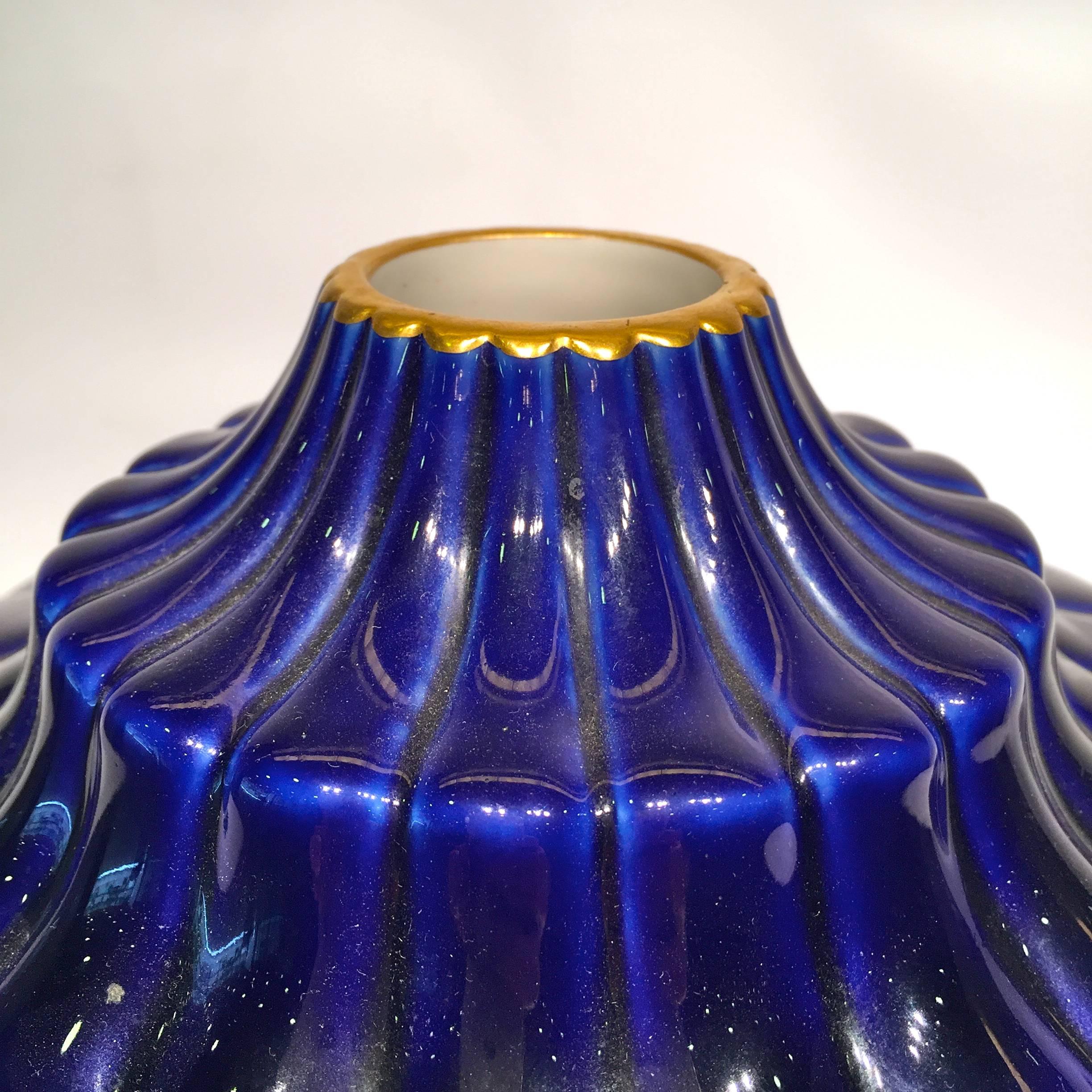 Sevres France, Art Deco porcelain blue and gold vase, circa 1930.