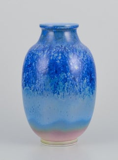 Sevres, France. Large porcelain vase with crystal glaze in blue shades.
