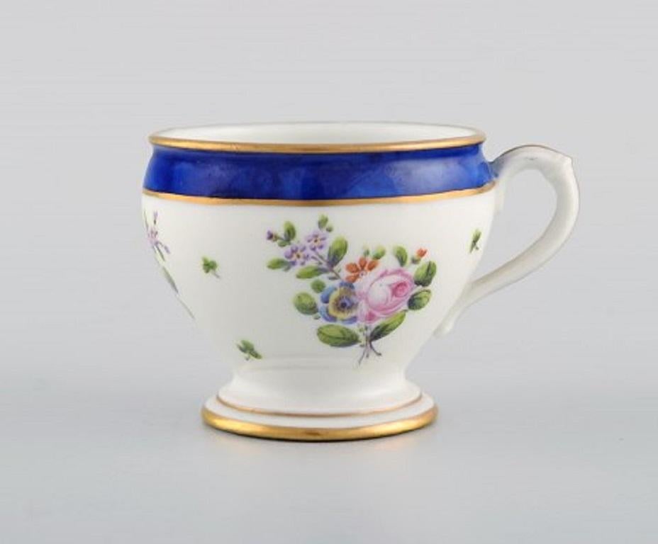 Sevres, France. Two antique cream cups in hand painted porcelain with flowers and gold decoration, 19th century.
Measures: 6 x 6 cm.
In excellent condition.
Stamped.
  