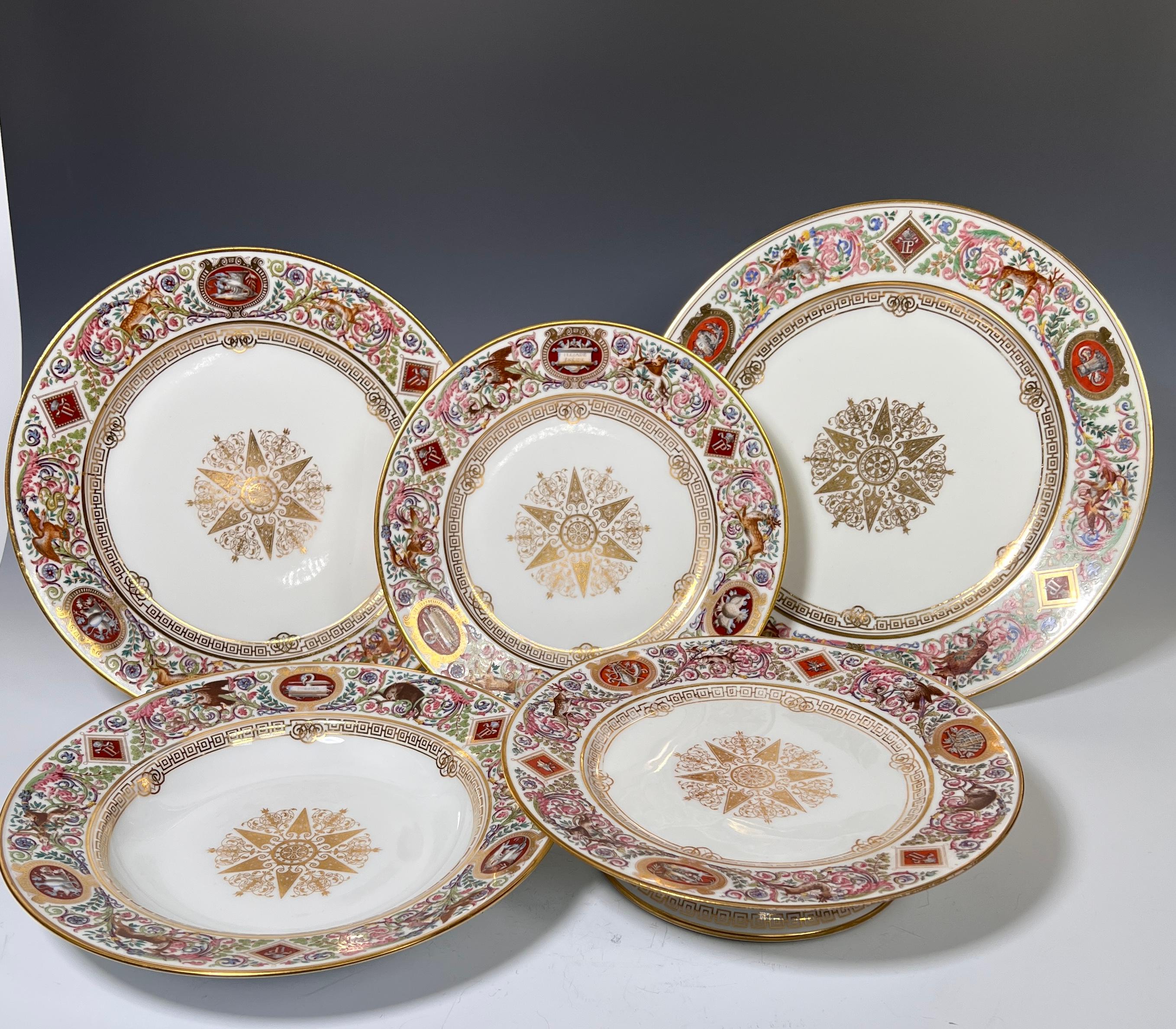 This service for 12 is the iconic Hunting Pattern made for Louis-Phillipe at Chateau Fontainebleau dated 1846. This museum quality set consists of 50 pieces including 12 dinner plates, 12 large rimmed soup bowls, 12 dessert plates and 12 luncheon