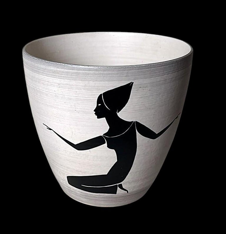 Ancien cache pot en faience barbotine à tête