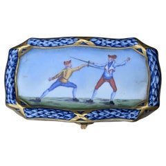 Boîte en porcelaine de Sèvres, bleu cobalt avec décor d'escrimeurs