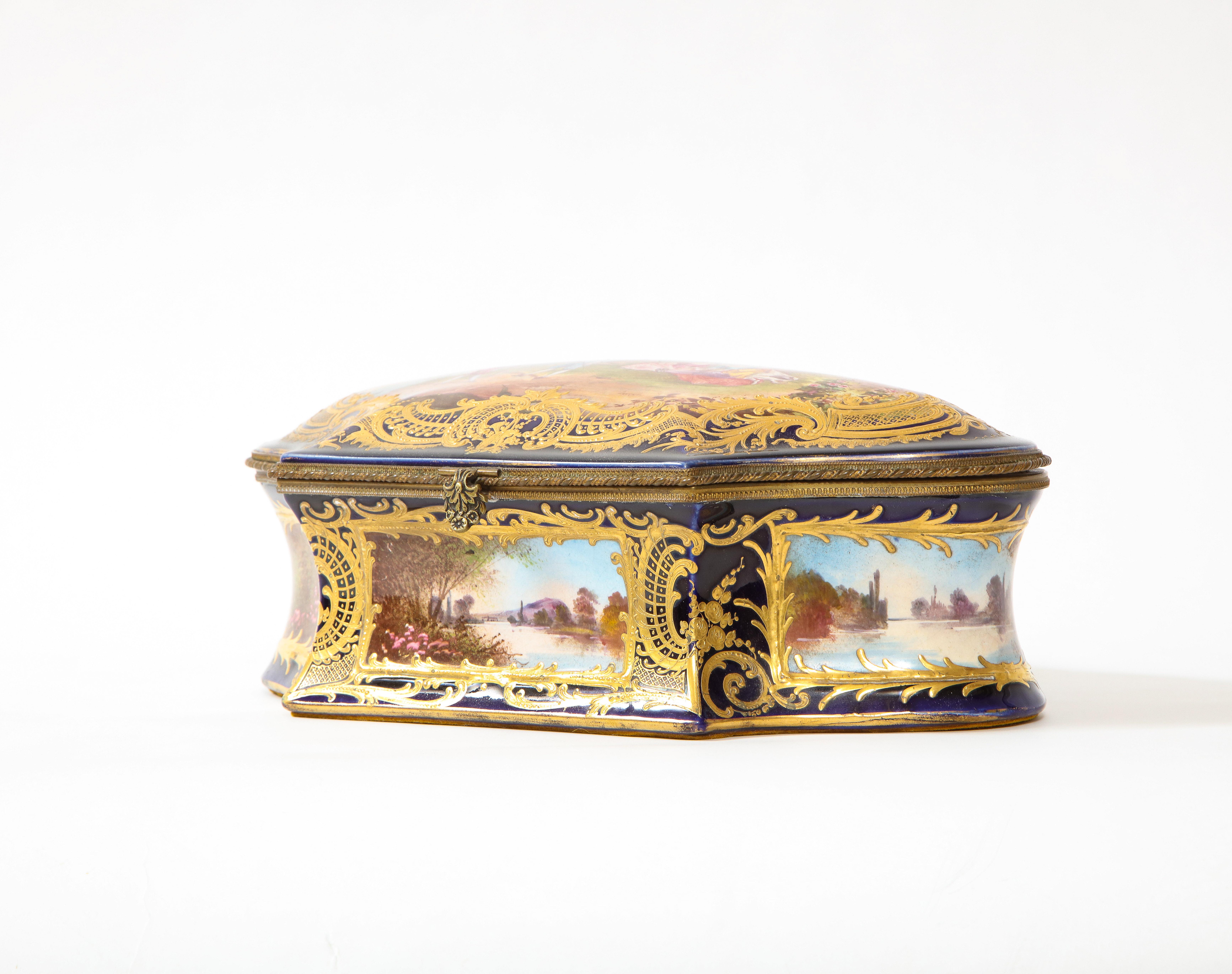 French Sevres Porcelain Cobalt Blue Ground Watteau Lovers Scene Bombay form Box, Signed For Sale