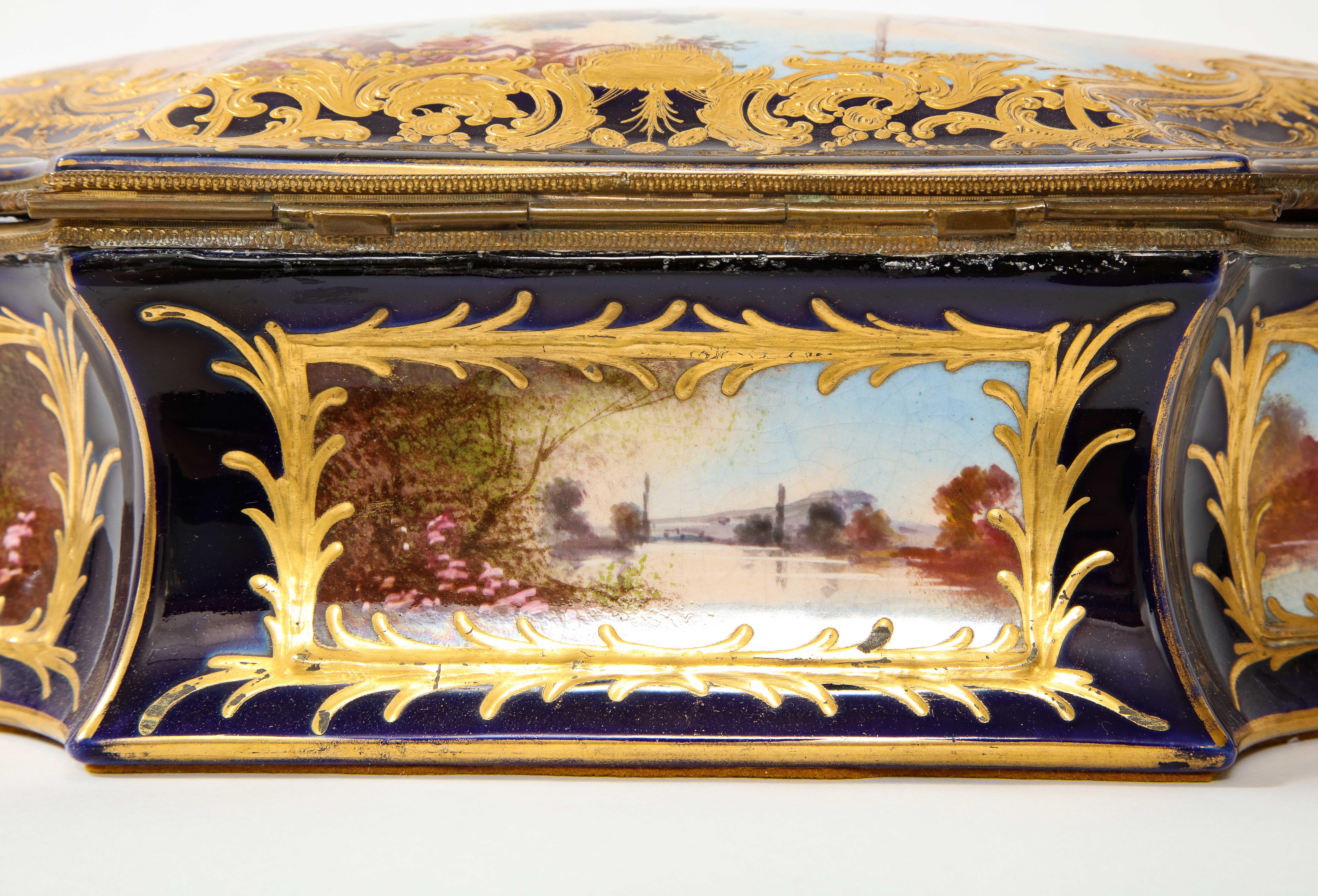 Late 19th Century Sevres Porcelain Cobalt Blue Ground Watteau Lovers Scene Bombay form Box, Signed For Sale