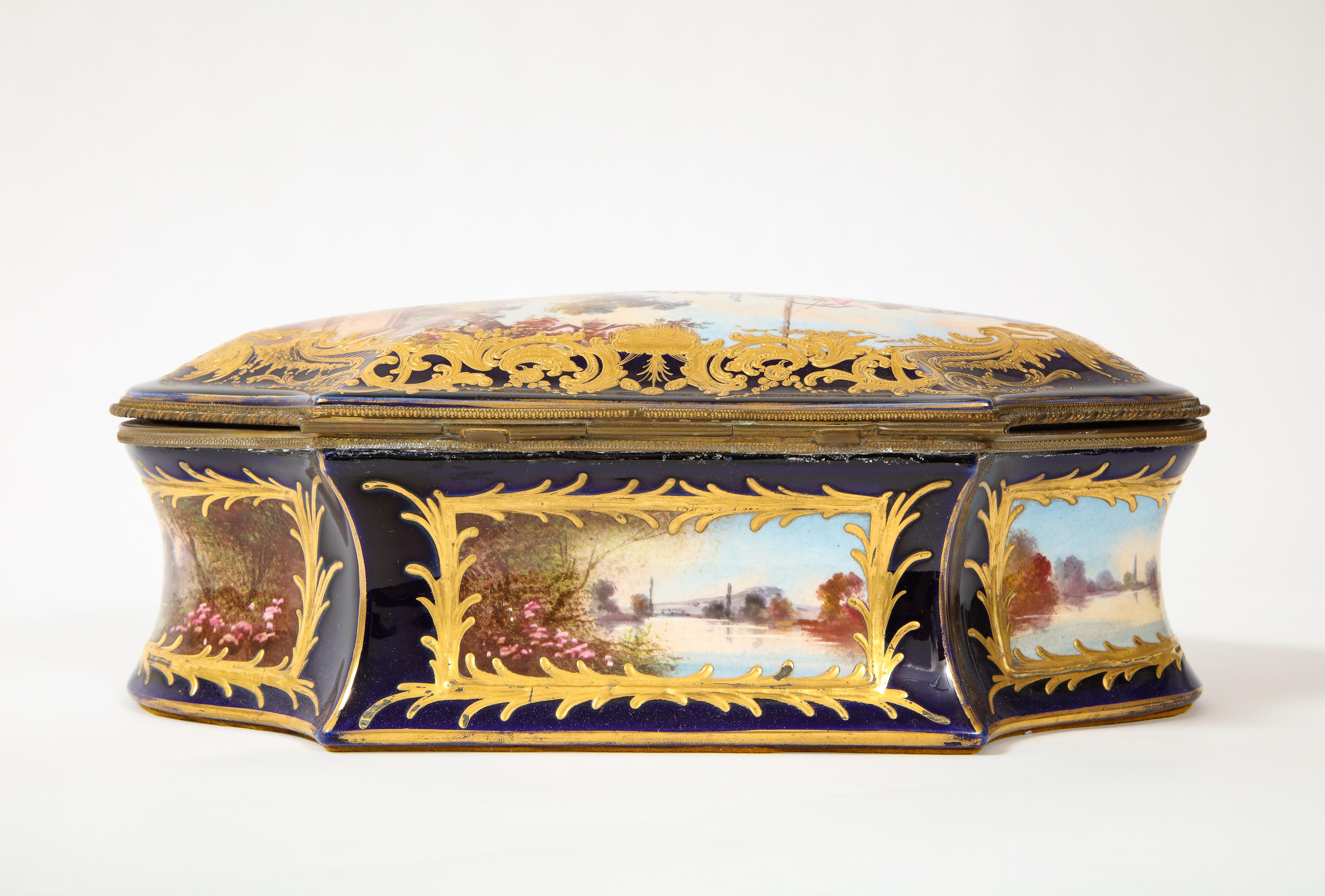 Sevres Porcelain Cobalt Blue Ground Watteau Lovers Scene Bombay form Box, Signed In Good Condition For Sale In New York, NY