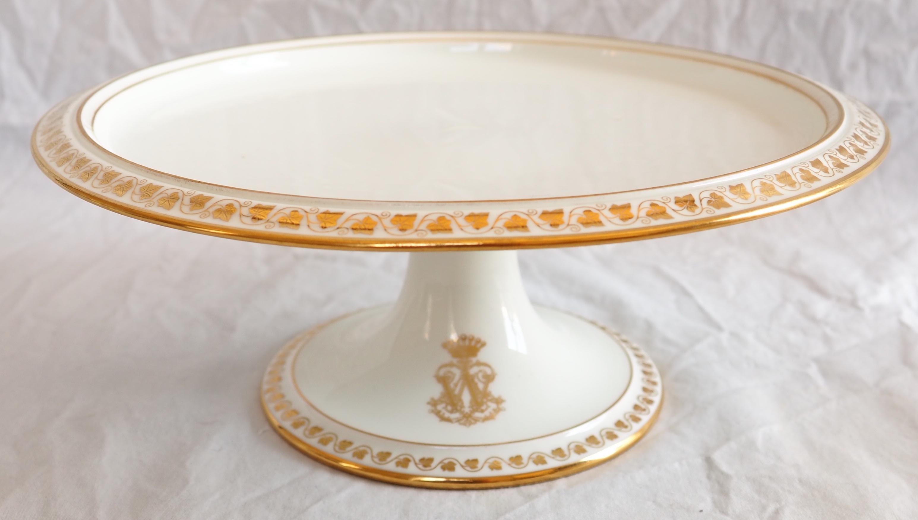 Sevres porcelain serving plate on a pedestal, beautiful grape leaves pattern decoration with fine gold.
This pattern has been very famous and sought after in France since it used to be the Empire style model used by King of France Louis Philippe and
