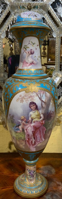 Sevres style 19 th c. Urn in Celeste blue, Hand painted in pastel hues