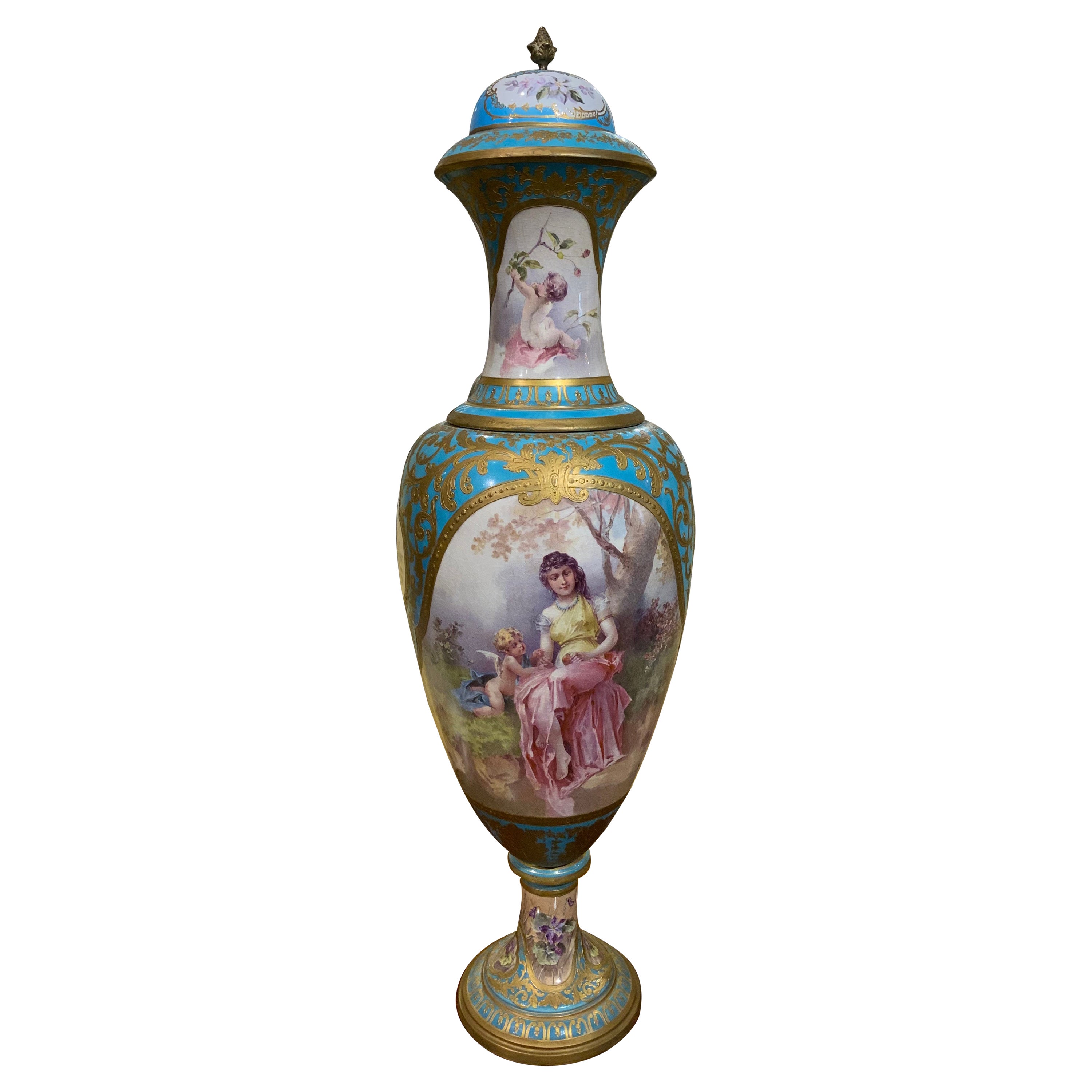 Sevres style 19 th c. Urn in Celeste blue, Hand painted in pastel hues