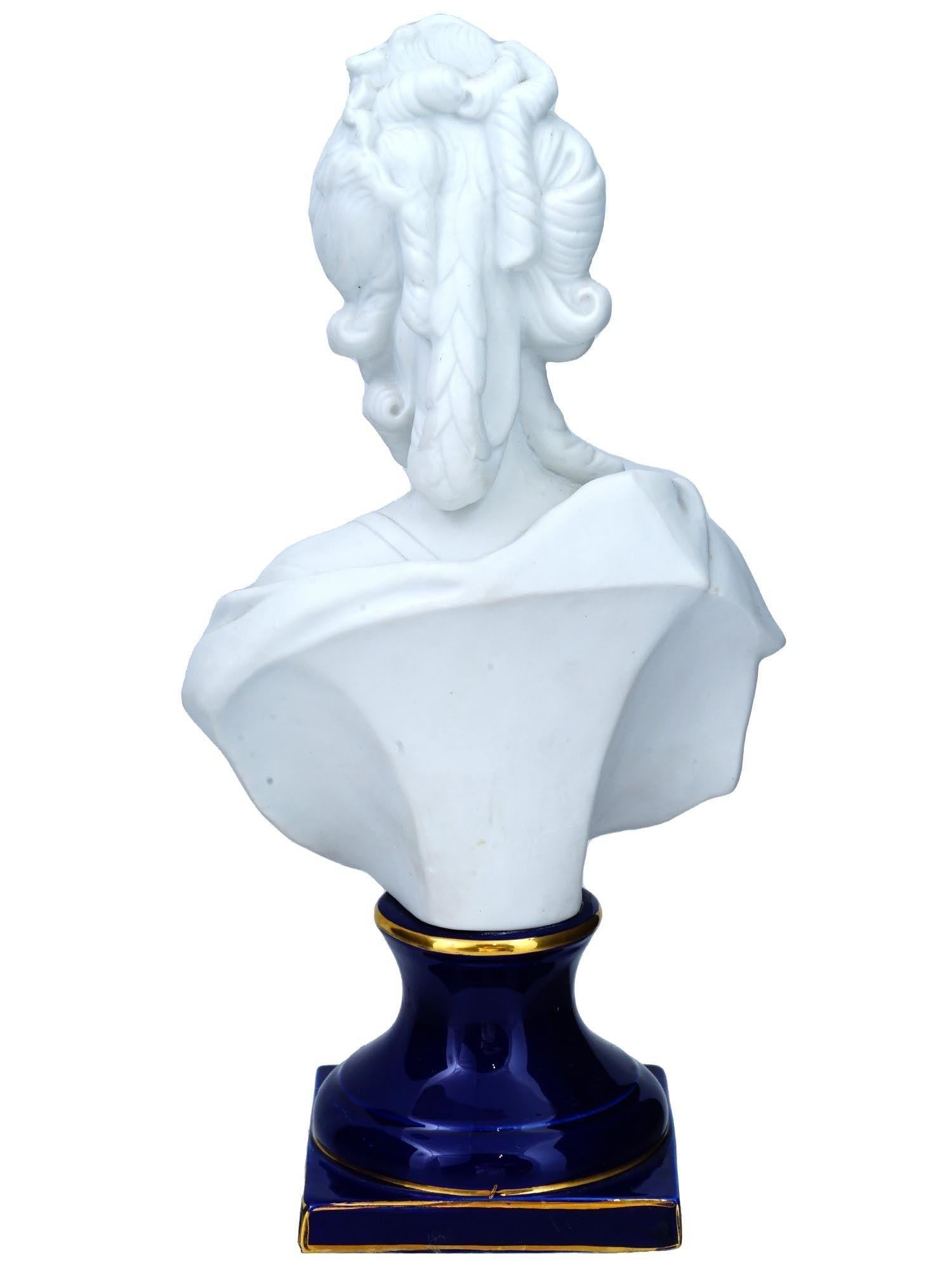 Antique continental bisque porcelain bust of Marie Antoinette in the French Sevres style with cobalt blue glazed finish and gilded accents.  Unsigned and in good condition.