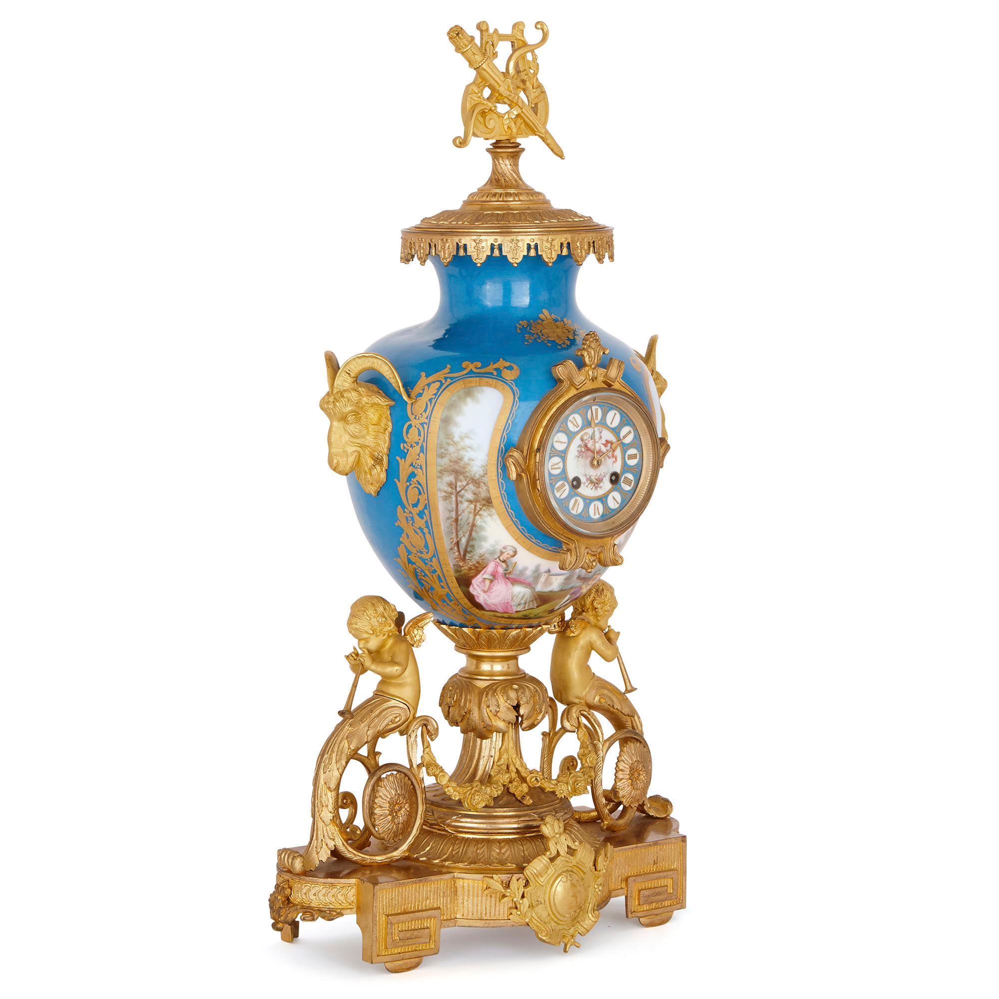 This large clock set, which is comprised of a mantel clock and pair of flanking candelabra, is designed in the style of Sèvres Porcelain manufactory goods. In the manner of Sèvres Porcelain, this set is decorated with delightful 18th century Rococo