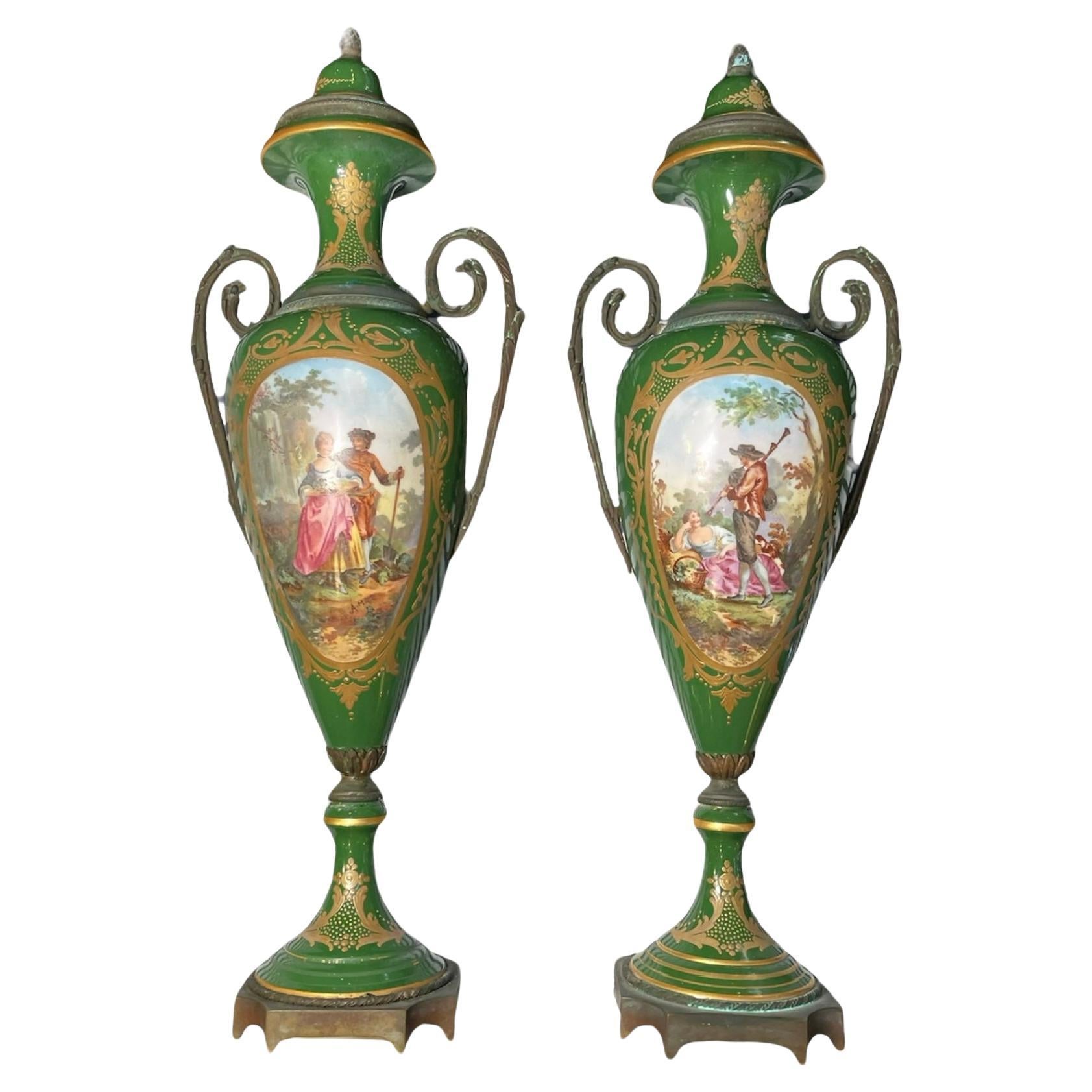 Sevres Style Hand Painted Porcelain And Bronze Pair Of Urns