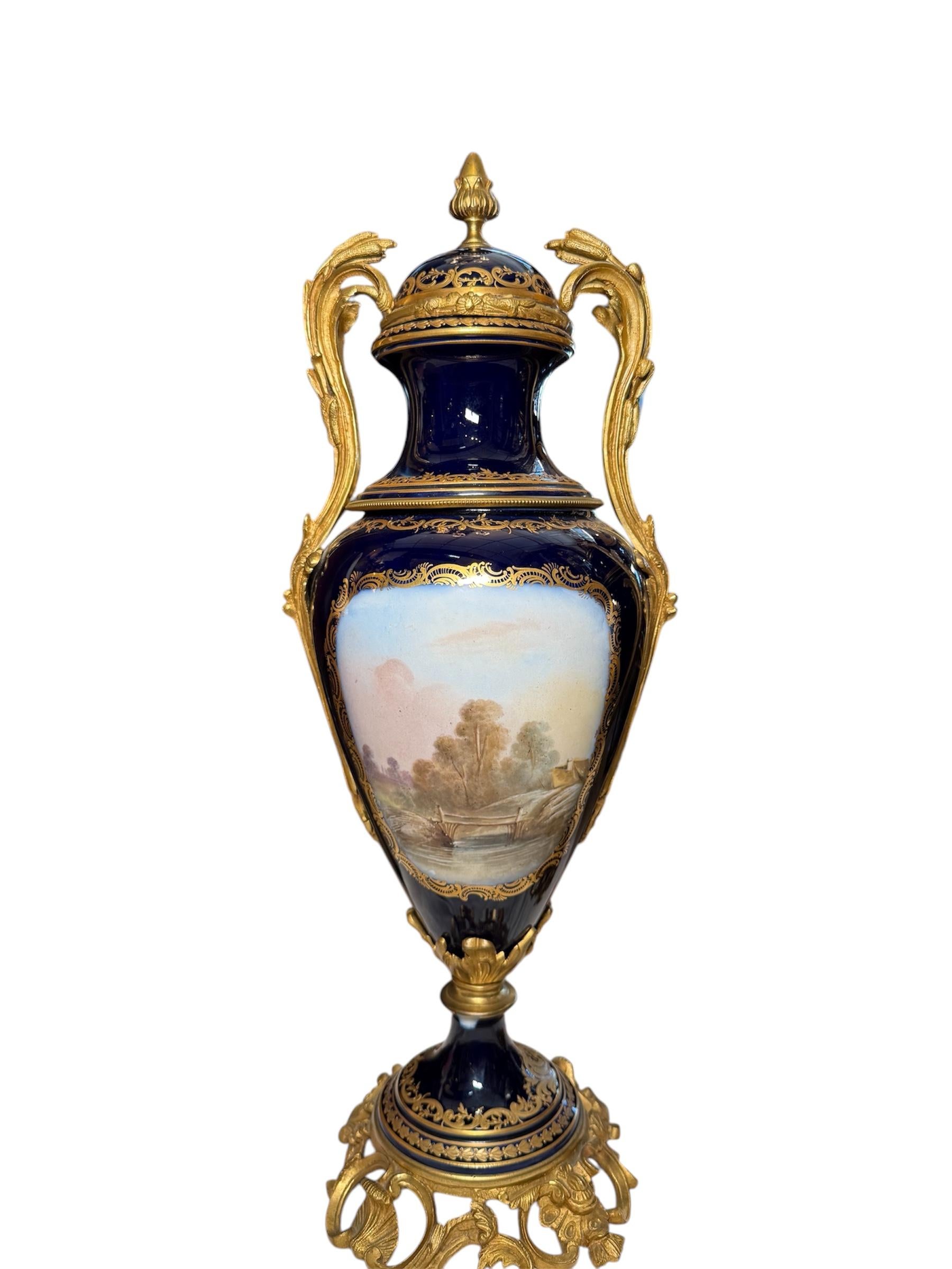 18th Century and Earlier Sevres Style Pair Of Gilt Cobalt Blue Urns For Sale