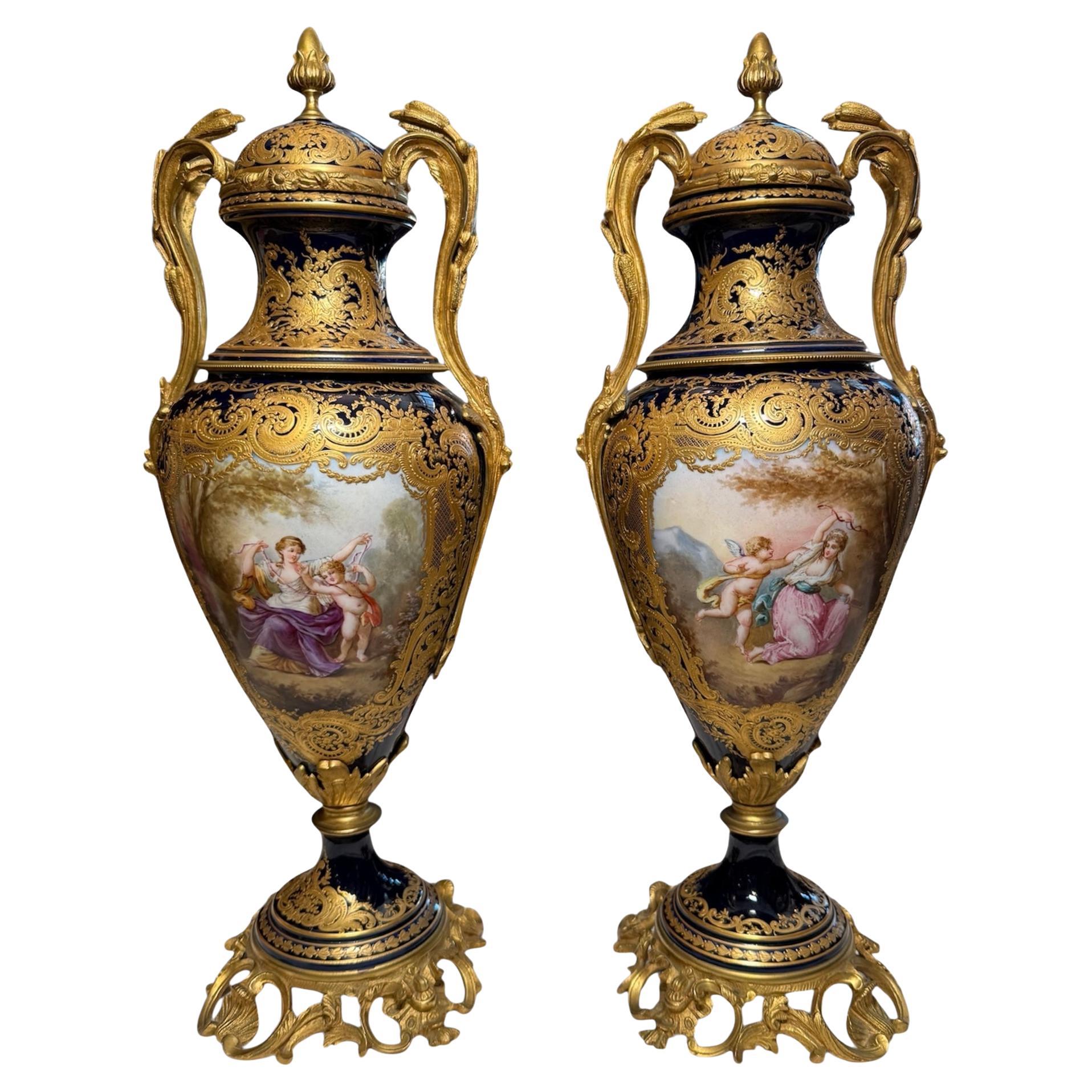 Sevres Style Pair Of Gilt Cobalt Blue Urns For Sale
