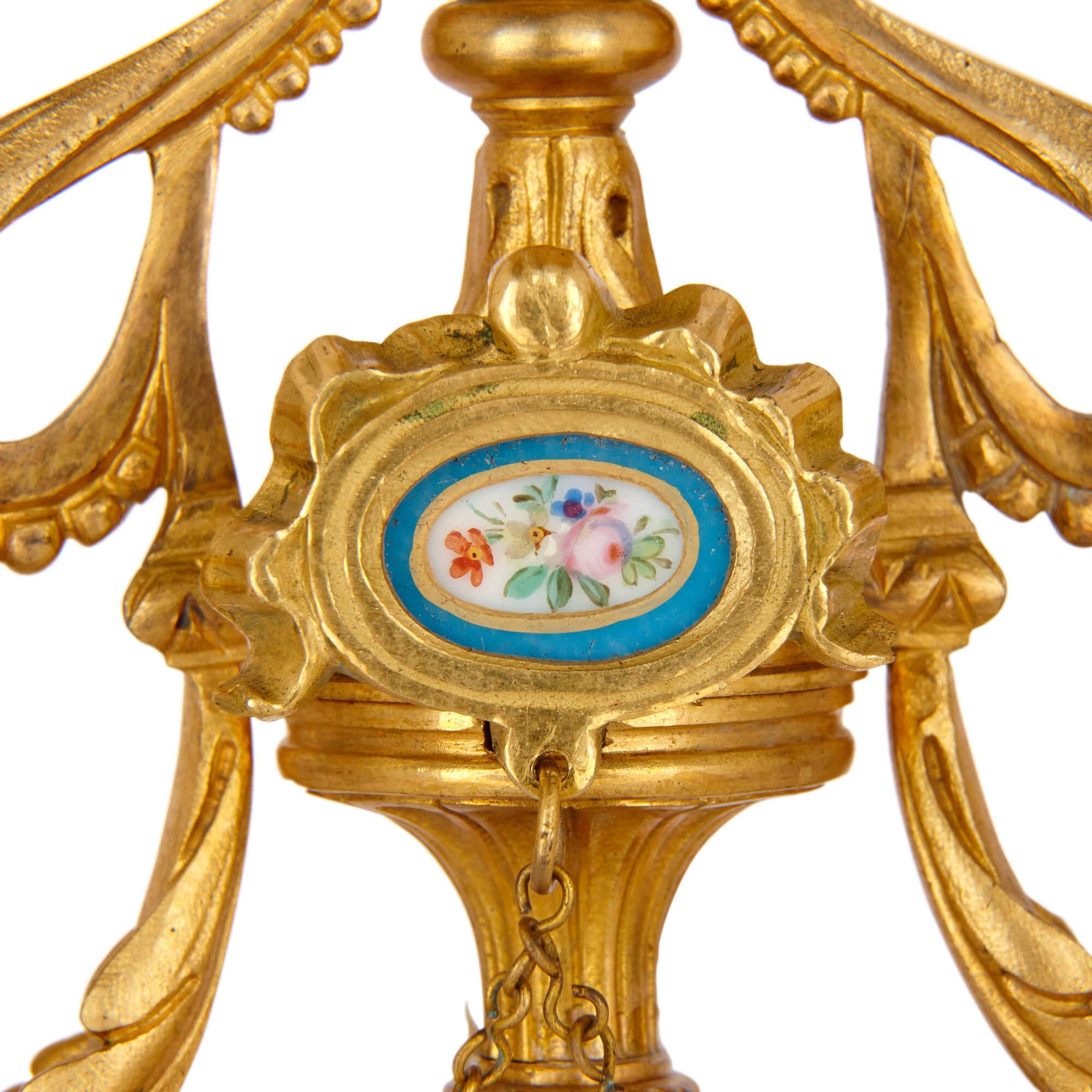 Three-piece French porcelain and gilt bronze clock set For Sale 3