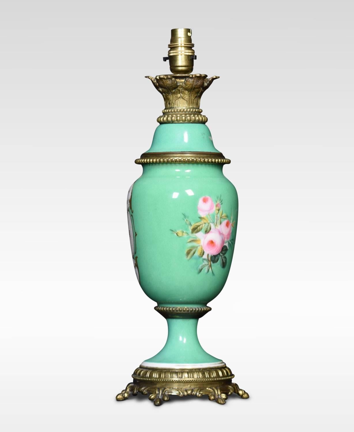 Sevres style table lamp table lamp. Hand-painted with gold detail. Featuring a central posy of flowers and similar decoration to the opposing side. Raised up on gilded feet. Having matched pale rose and green fringed lampshade.
Dimensions
Height