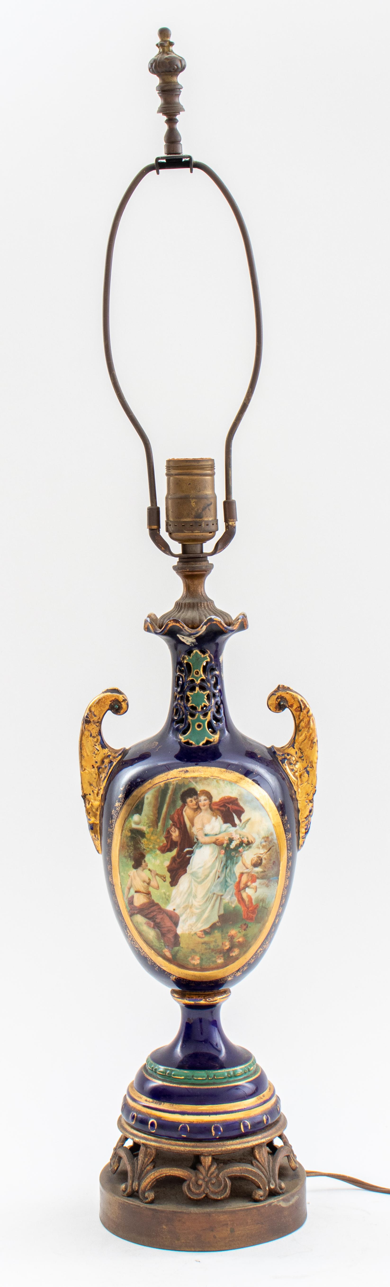 Sevres style vase mounted as a lamp, the blue ground two-handled vase with a central cartouche depicting Hebe and a suitor. Measures: 30