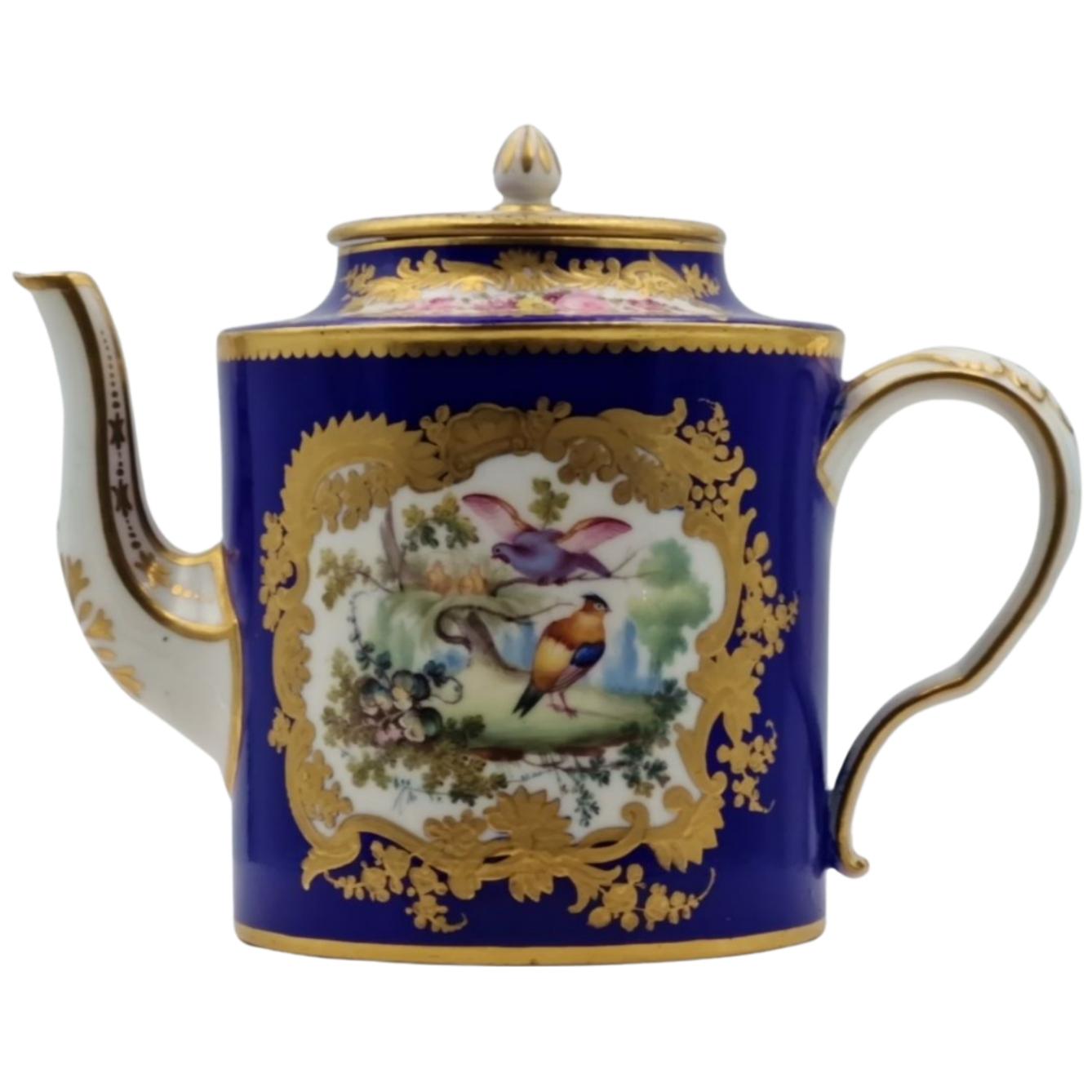 A teapot from early Sevres production (around 1780), obtained as a blank, and decorated in Thomas Martin Randall's workshop in the Sevres style. I addition to his skill in painting, he had some exceptional gilders in the workshop - note the raised