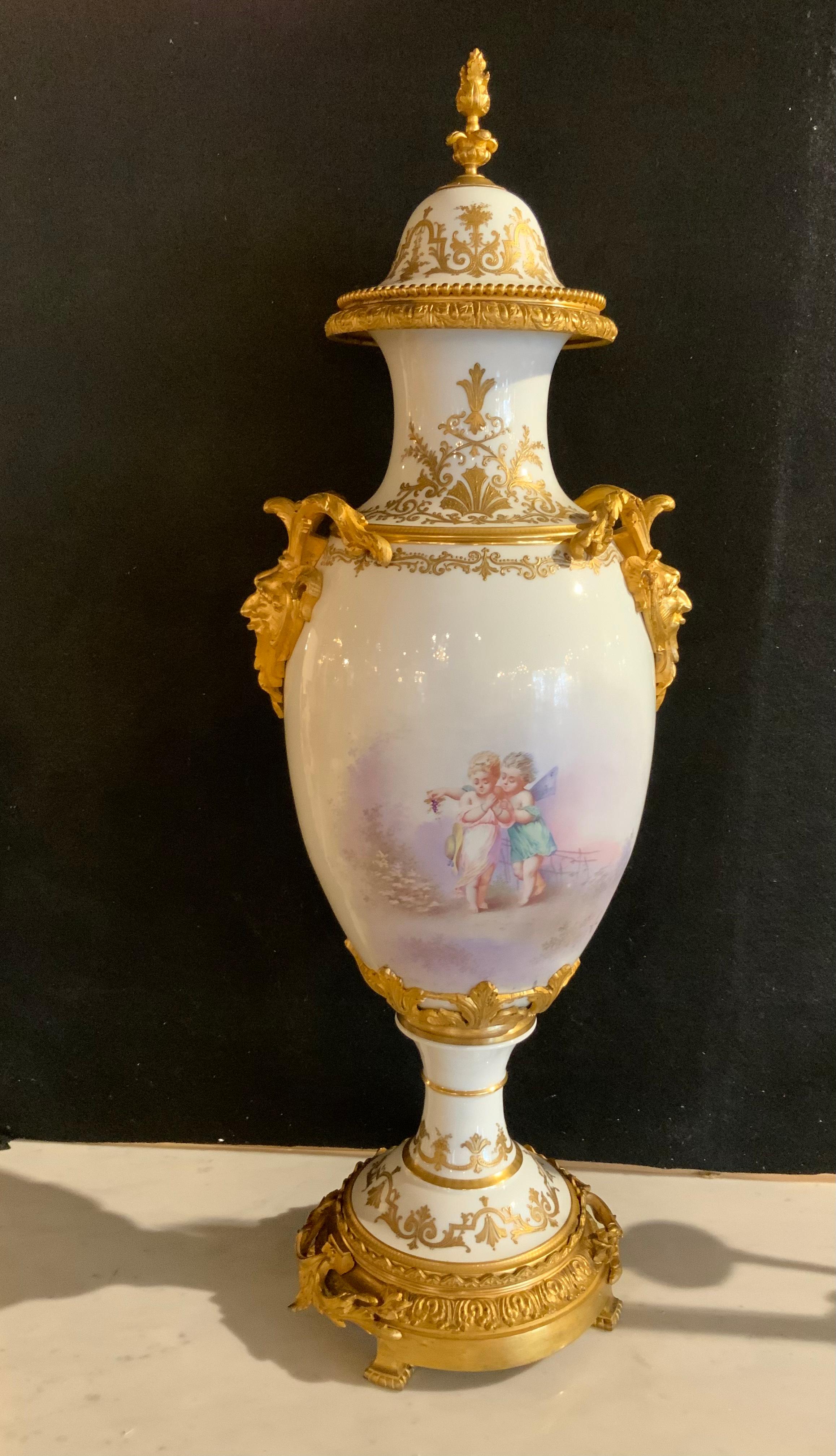 Sevres Urn 19 Th Century with Gilt Bronze Mounts and Gilt Masks, Hand Painted 4