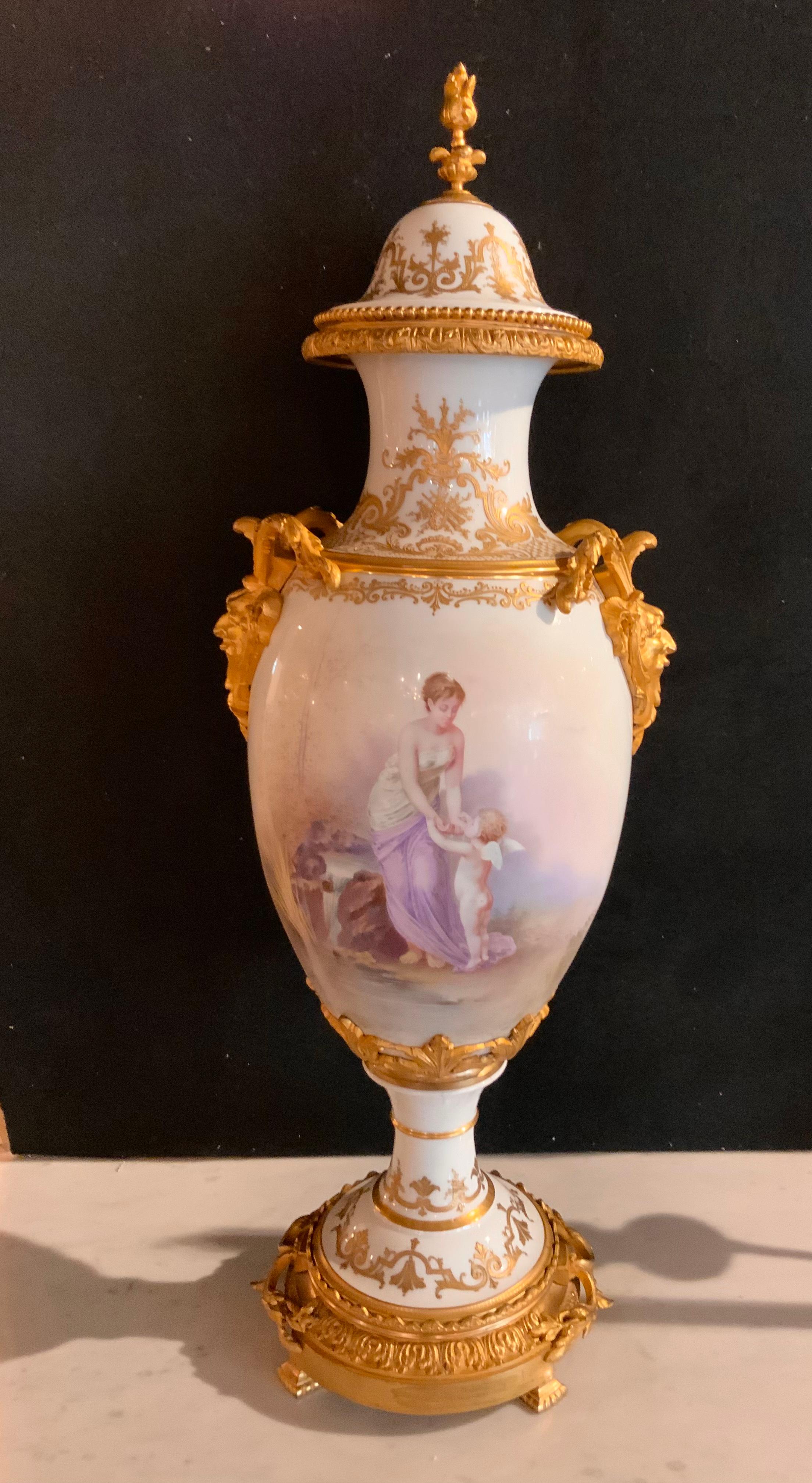 Hand-Painted Sevres Urn 19 Th Century with Gilt Bronze Mounts and Gilt Masks, Hand Painted For Sale