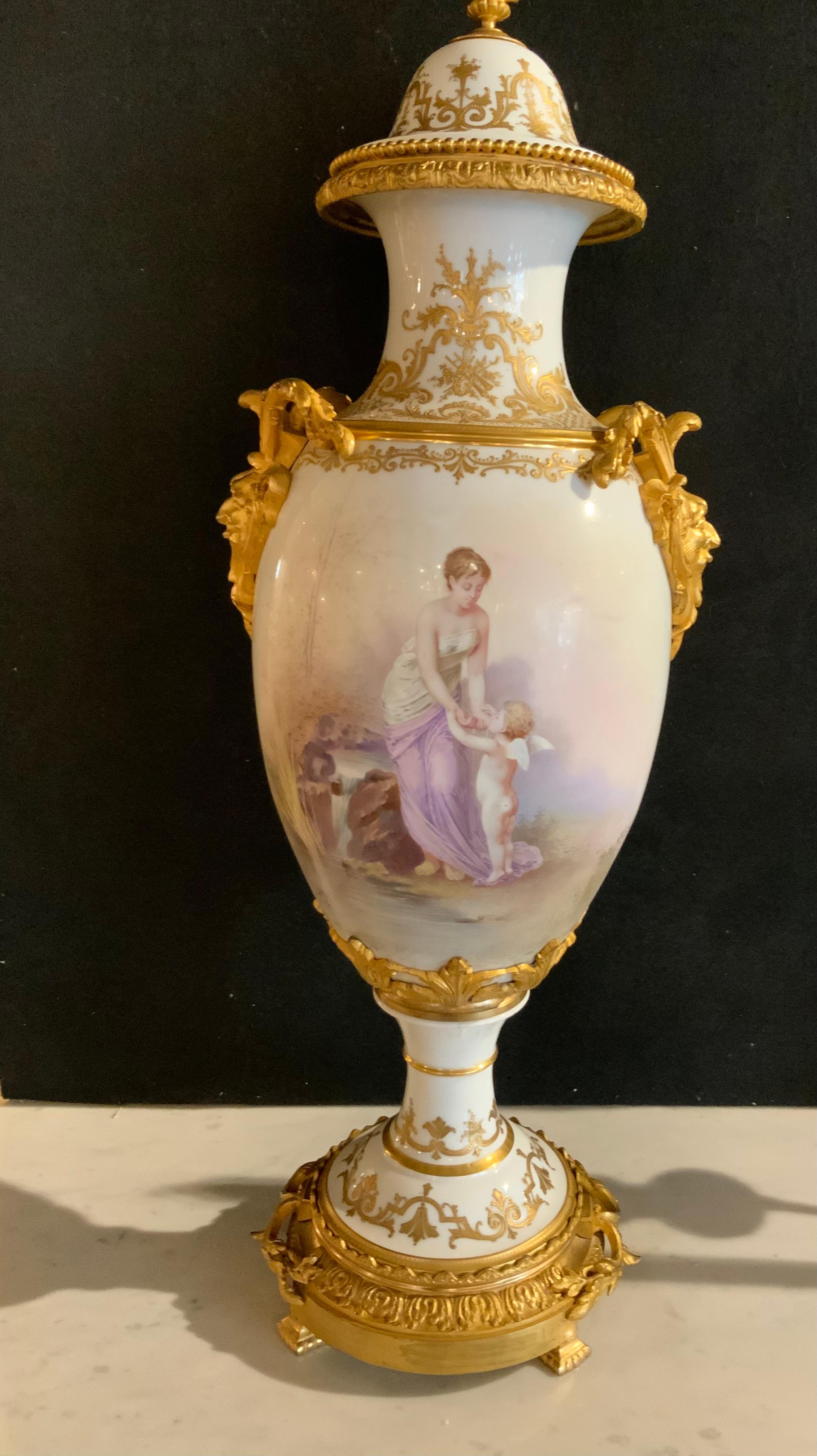 Sevres Urn 19 Th Century with Gilt Bronze Mounts and Gilt Masks, Hand Painted In Excellent Condition In Houston, TX