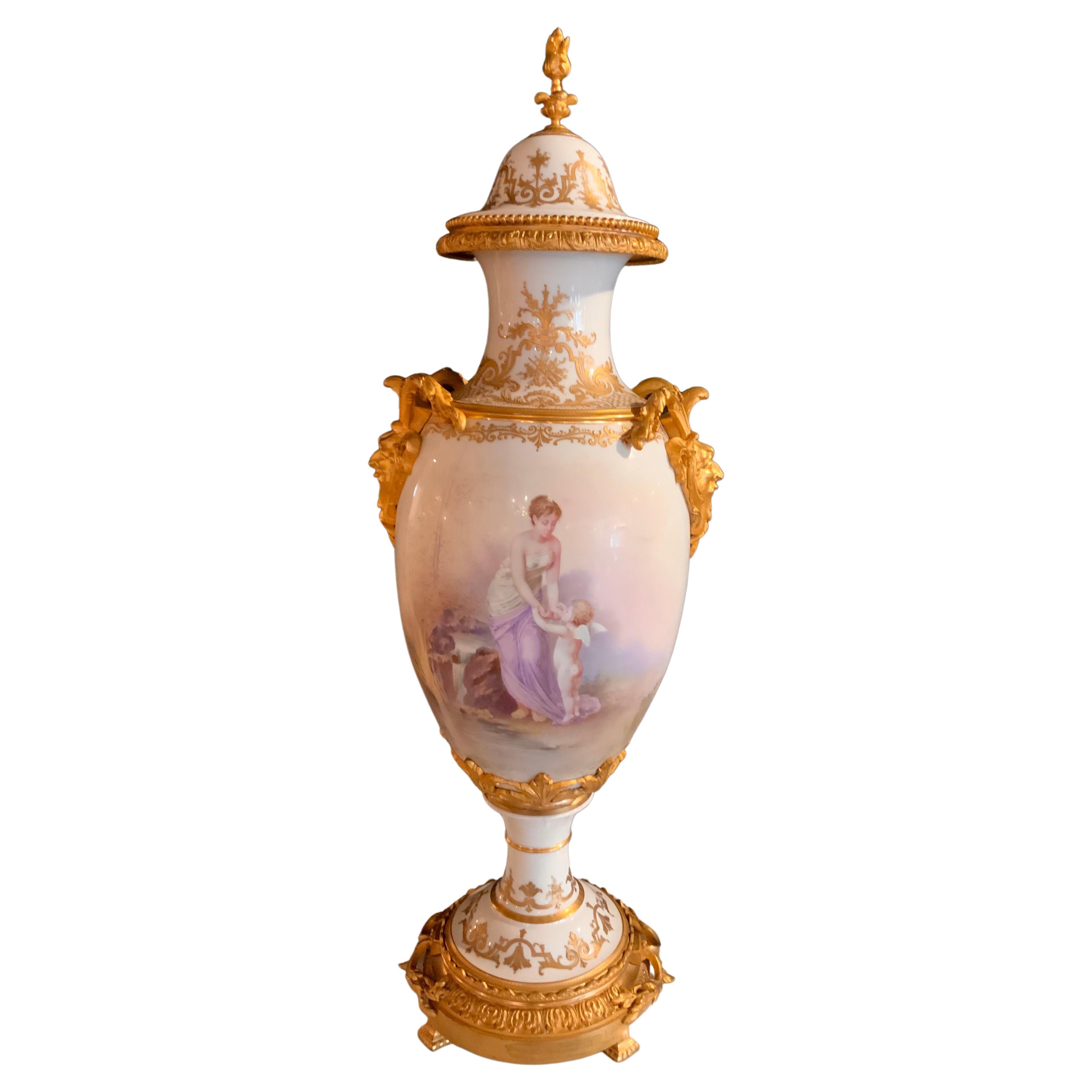 Sevres Urn 19 Th Century with Gilt Bronze Mounts and Gilt Masks, Hand Painted For Sale