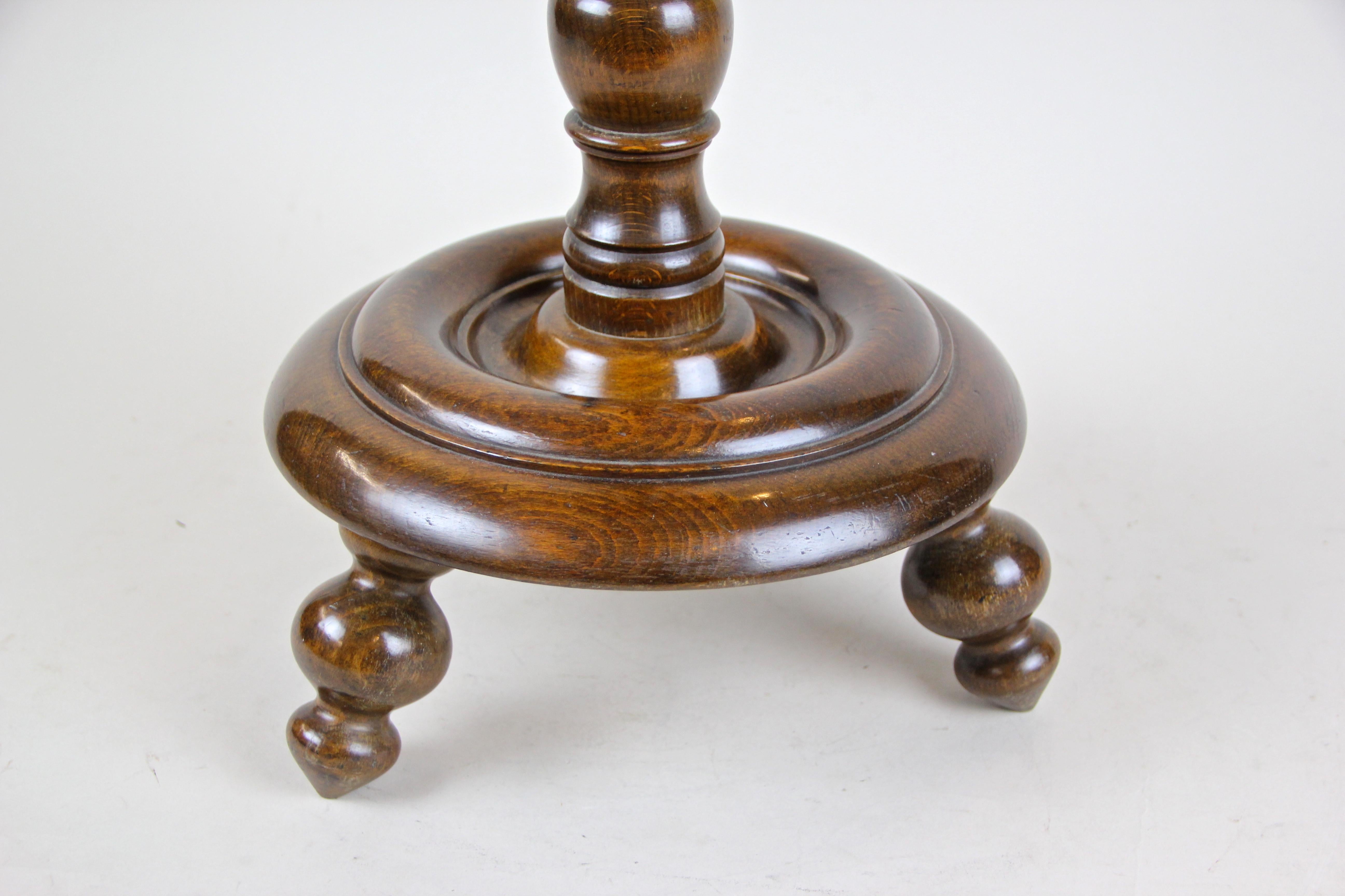 Beautiful carved sewing table/ column from the so called Historism period in Austrian, circa 1880. Artfully shaped out of beech wood and trimmed to a nut wood look, this column can be totally disassembled. On top you will find the needle box with a