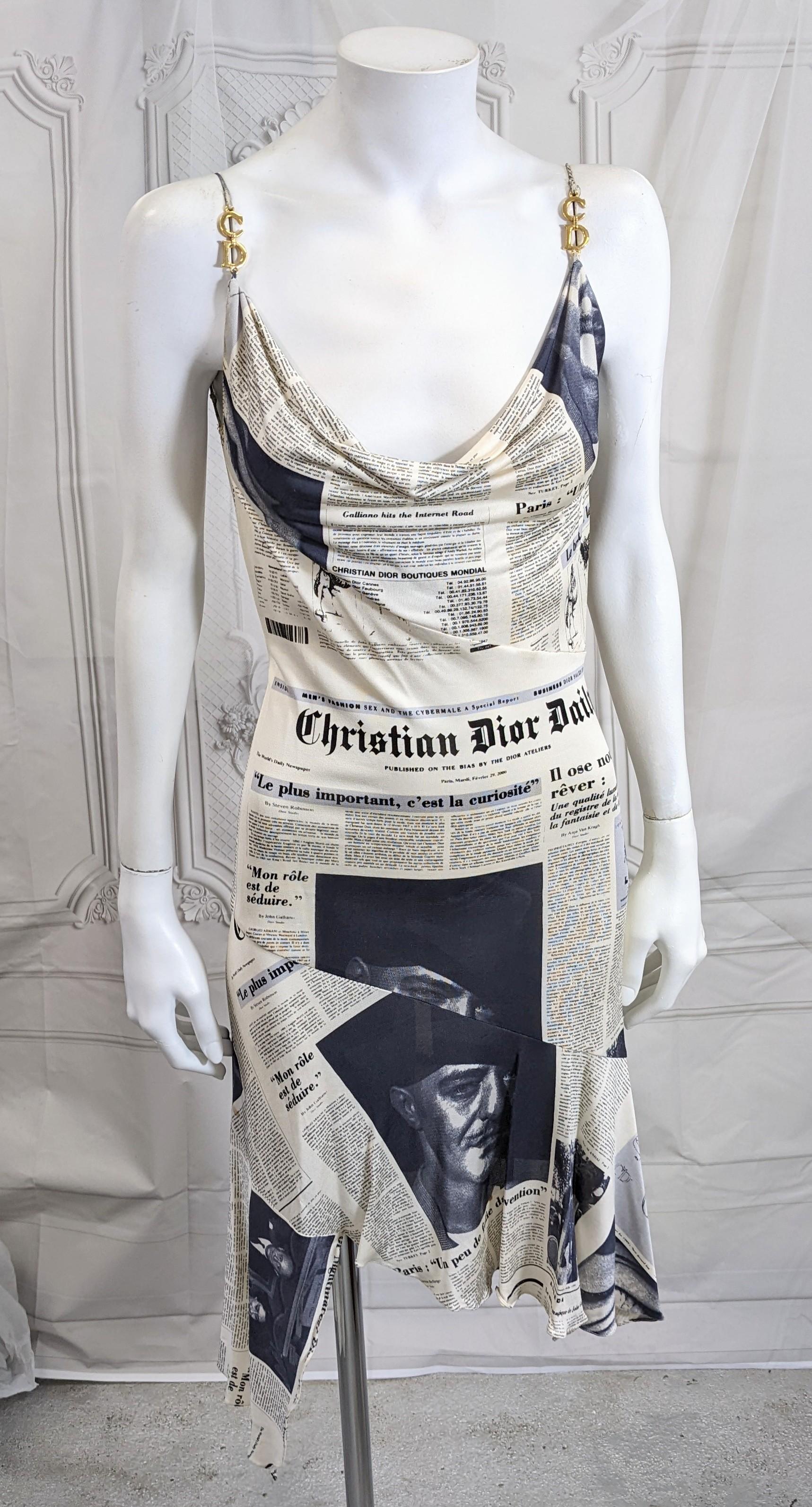 Being offered is the Iconic John Galliano for Christian Dior Autumn/Winter 2000-2001  Newsprint Dress WORN by Sarah Jessica Parker and lent by Vintage Luxury N.Y. for Sex and the City 2, the movie.
The iconic Dior newsprint dress first appears in