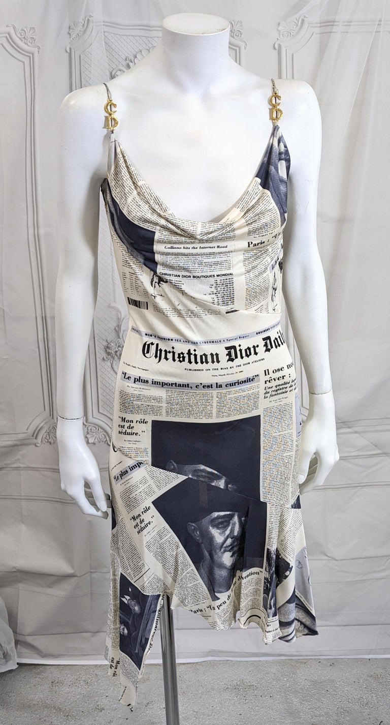 Being offered is the iconic John Galliano for Christian Dior Autumn/Winter 2000-2001  Newsprint Dress worn by Sarah Jessica Parker and lent by Vintage Luxury N.Y. for Sex and the City 2, the movie.
The iconic Dior newsprint dress first appears in