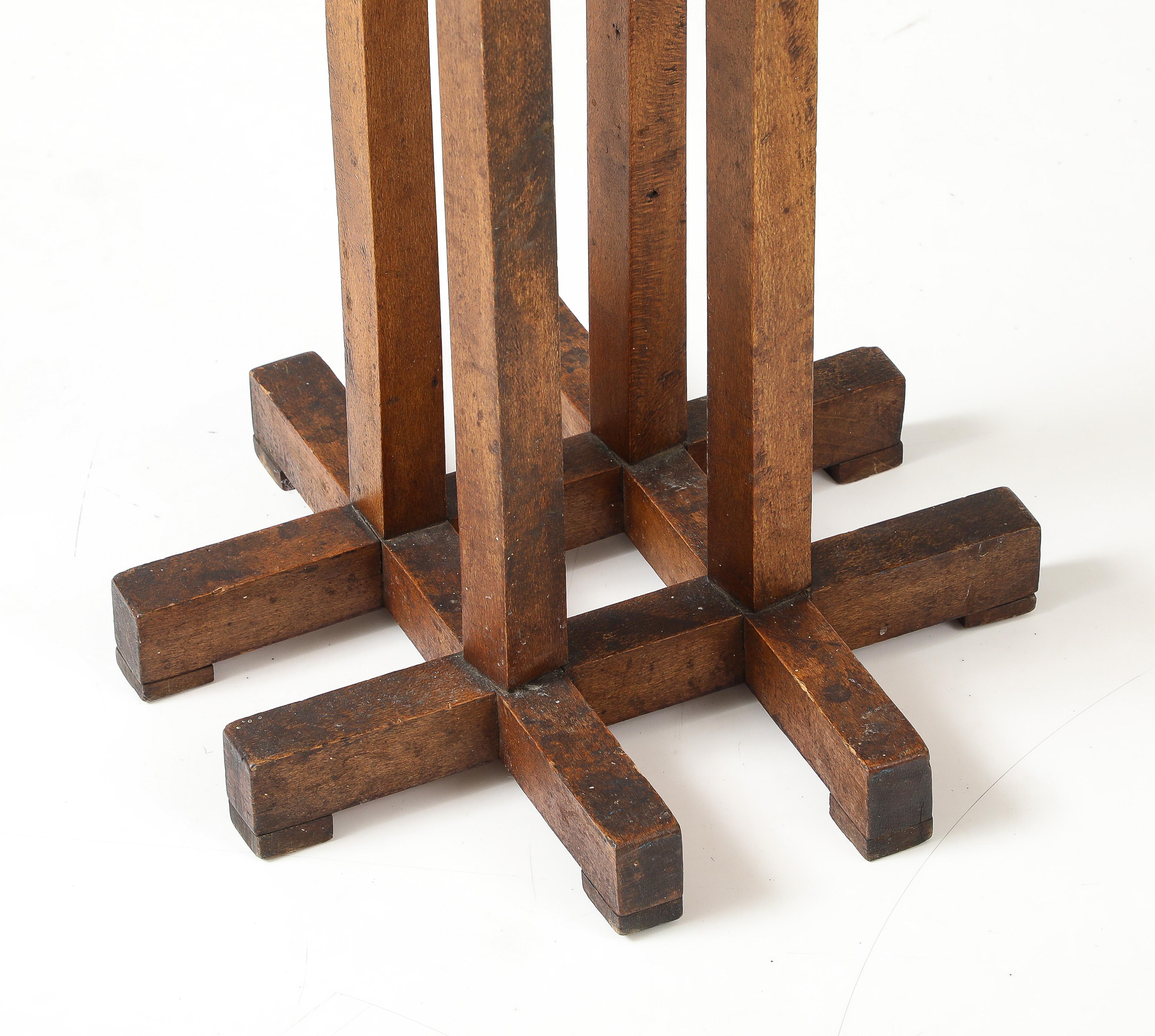 Hextogonal Walnut & Oak Table with four supports forming a grid Base, France, c. In Good Condition For Sale In Brooklyn, NY