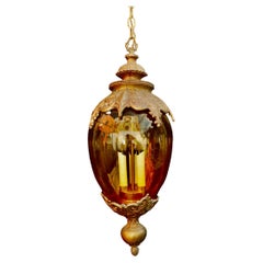 Lampe sexy en verre ambré des années 1960