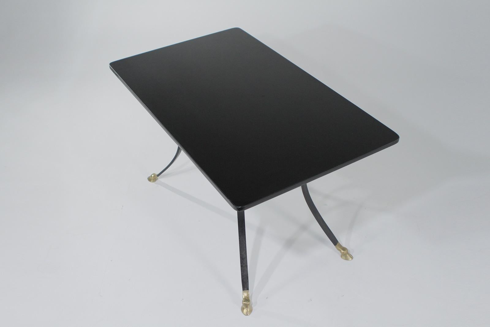 Hollywood Regency Sexy Black Glass and Wrought Iron Dining Table with Brass Feet