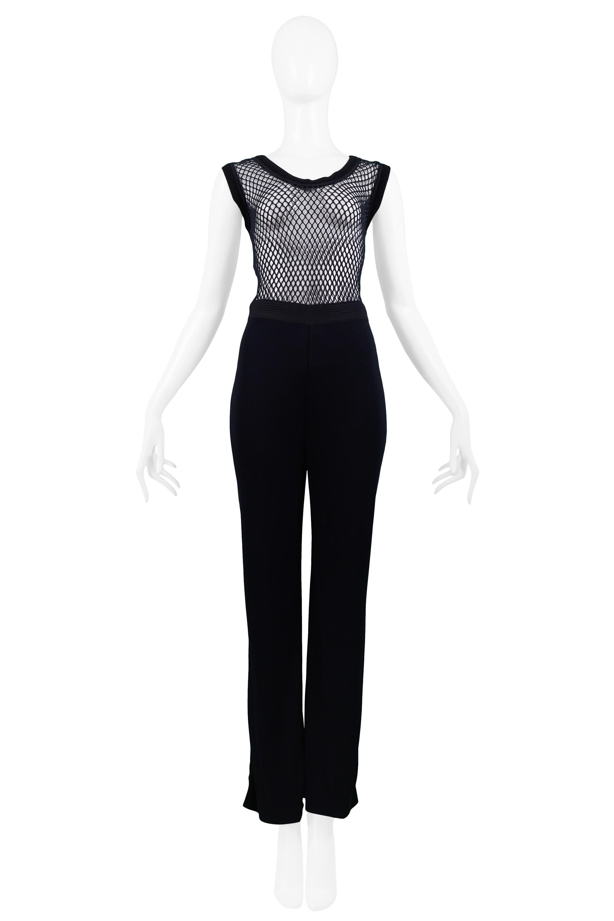 Resurrection Vintage is excited to offer a vintage Gianfranco Ferre black jumpsuit featuring a scoop-neck sleeveless mesh bodice with ribbed knit trim and high-waisted pants with a slight bootcut.

Gianfranco Ferre 
Size 40
Mesh & Jersey
Excellent
