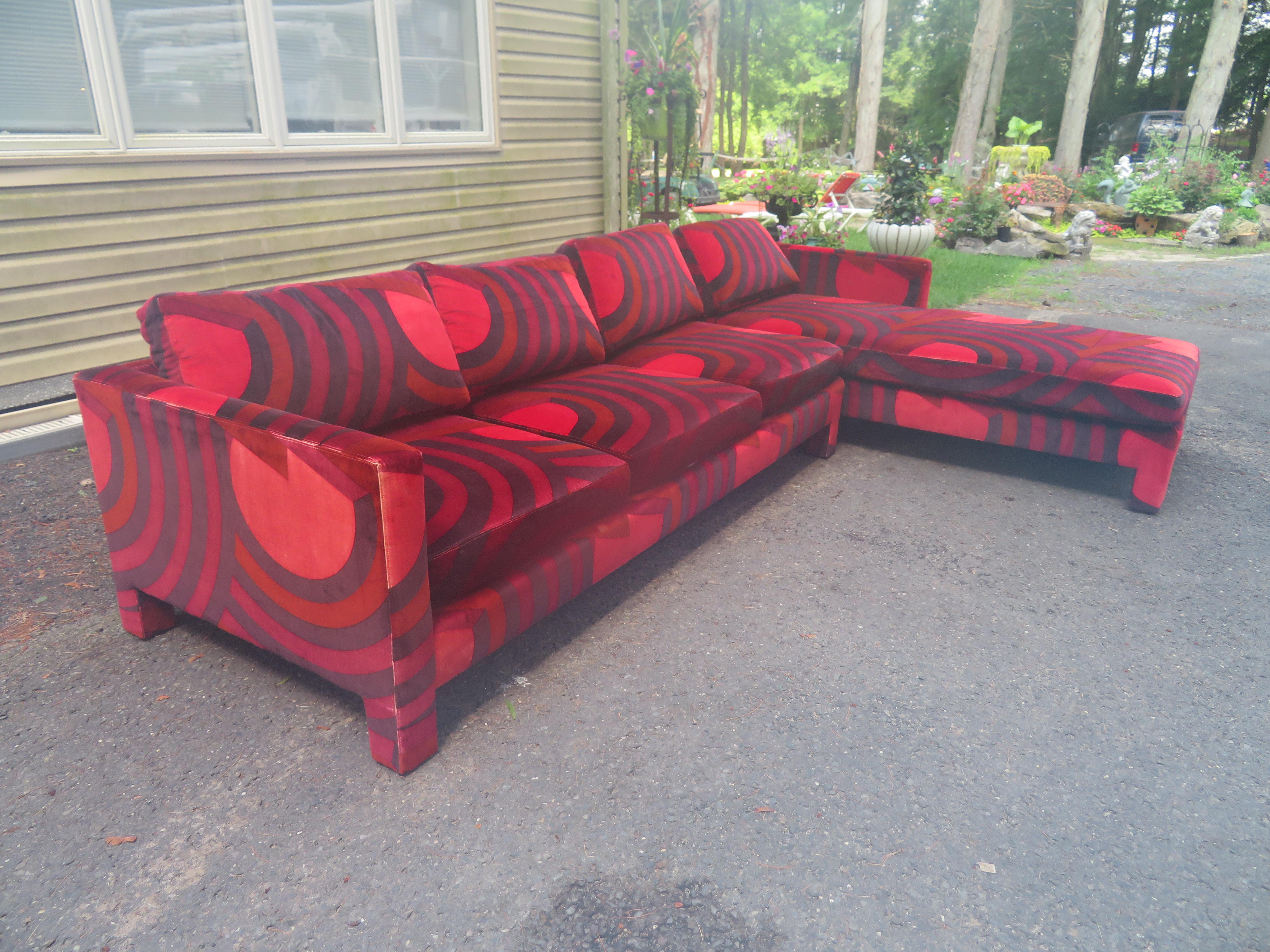 Super sexy Jack Lenor Larsen abstract red velvet sofa sectional. This is one of a kind masterpiece is attributed to Milo Baughman for Directional. The unusual Larsen velvet fabric is in nice vintage condition with minor age related wear-see photos.
