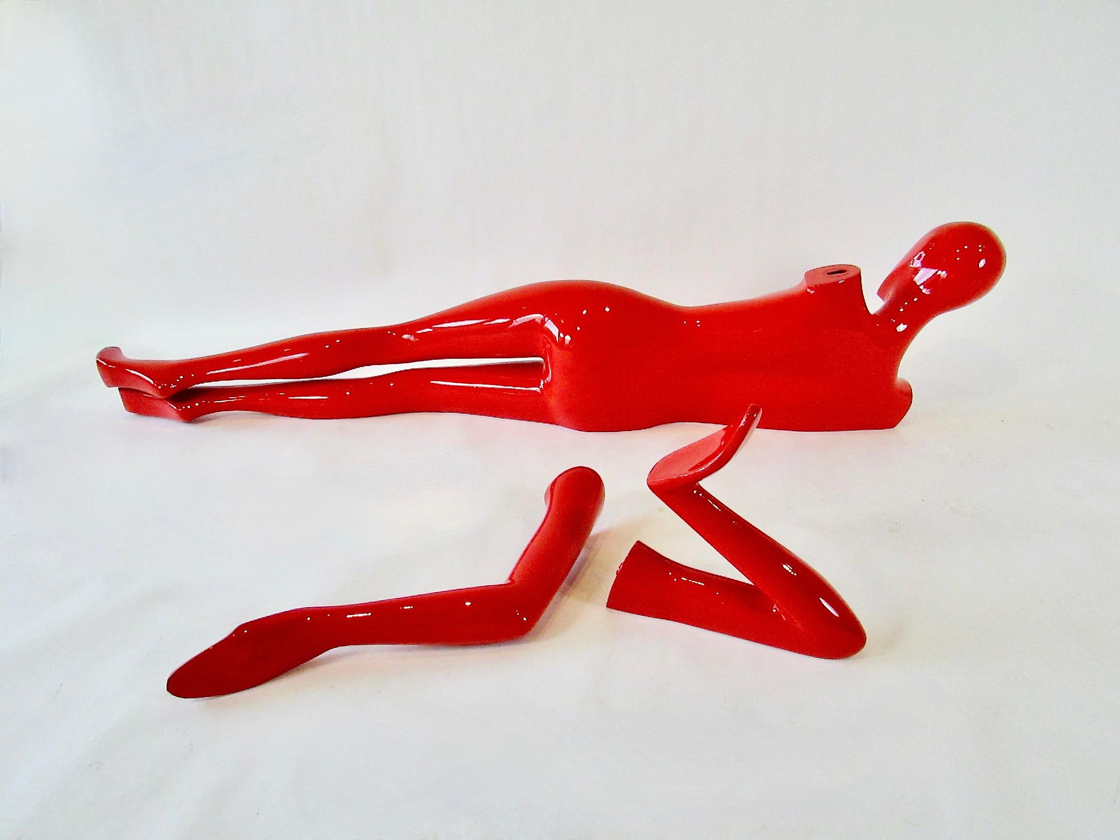 Sexy lady in red mannequin sculpture in head on hand repose 2