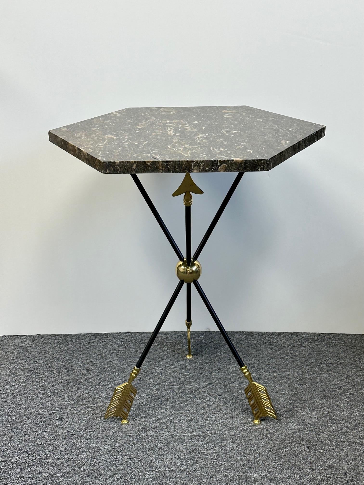 Sexy black and gold arrow motif martini table having a glam mix of an ebonized iron and brass base, topped with a lusciously lively 6 sided piece of black, brown and cream marble.