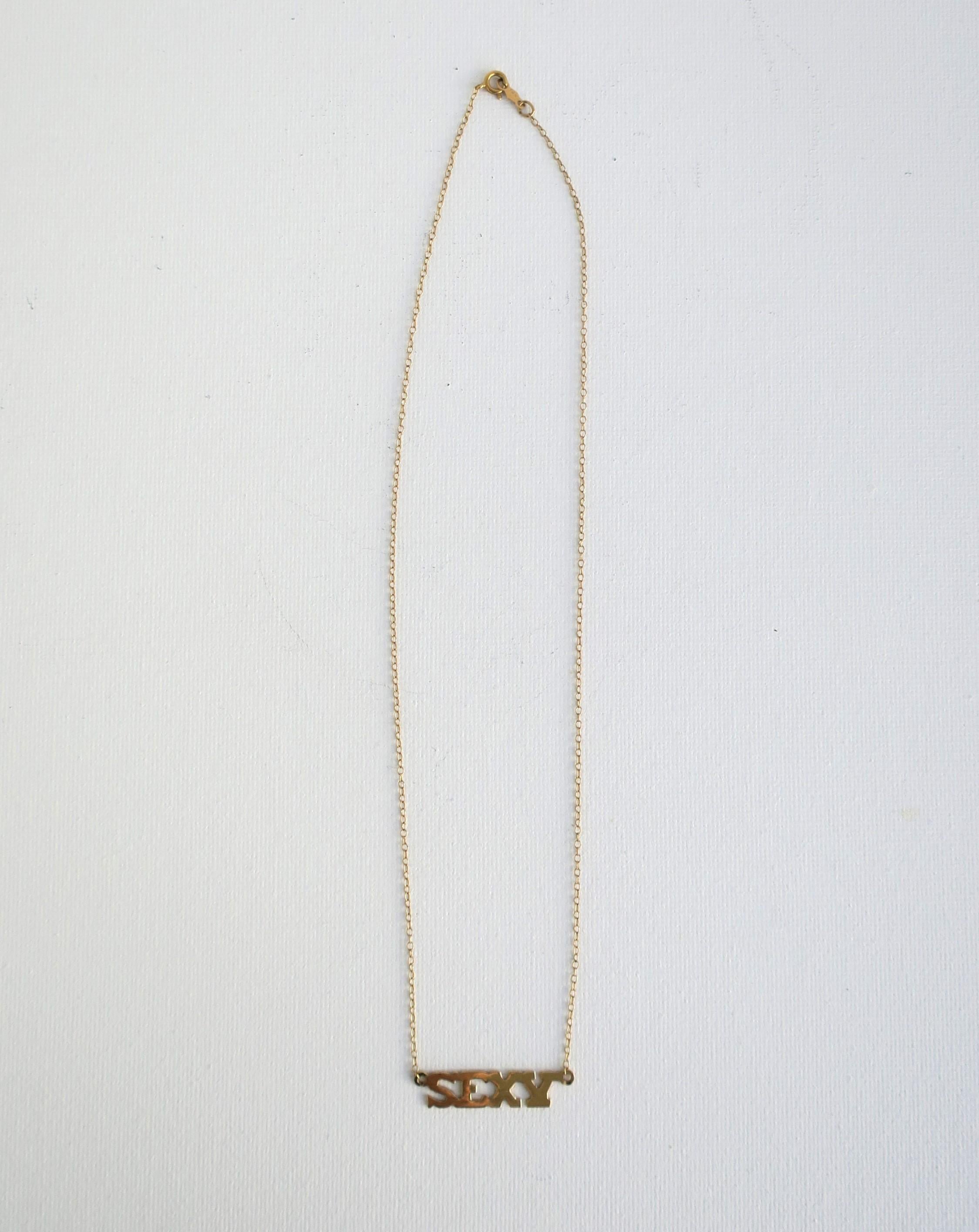 Sexy Nameplate Necklace 14-Karat Yellow Gold, circa 1970s Disco Era 1