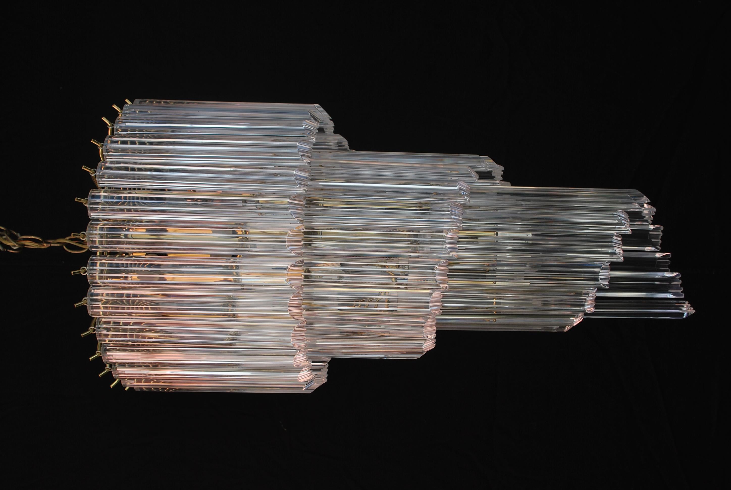 A beautiful and sexy pair of 1970's lucite lights, the price is for the pair, the design of each bar is very unusual, ( see pictures ), we can sell them individual, they can be flush if you wish.