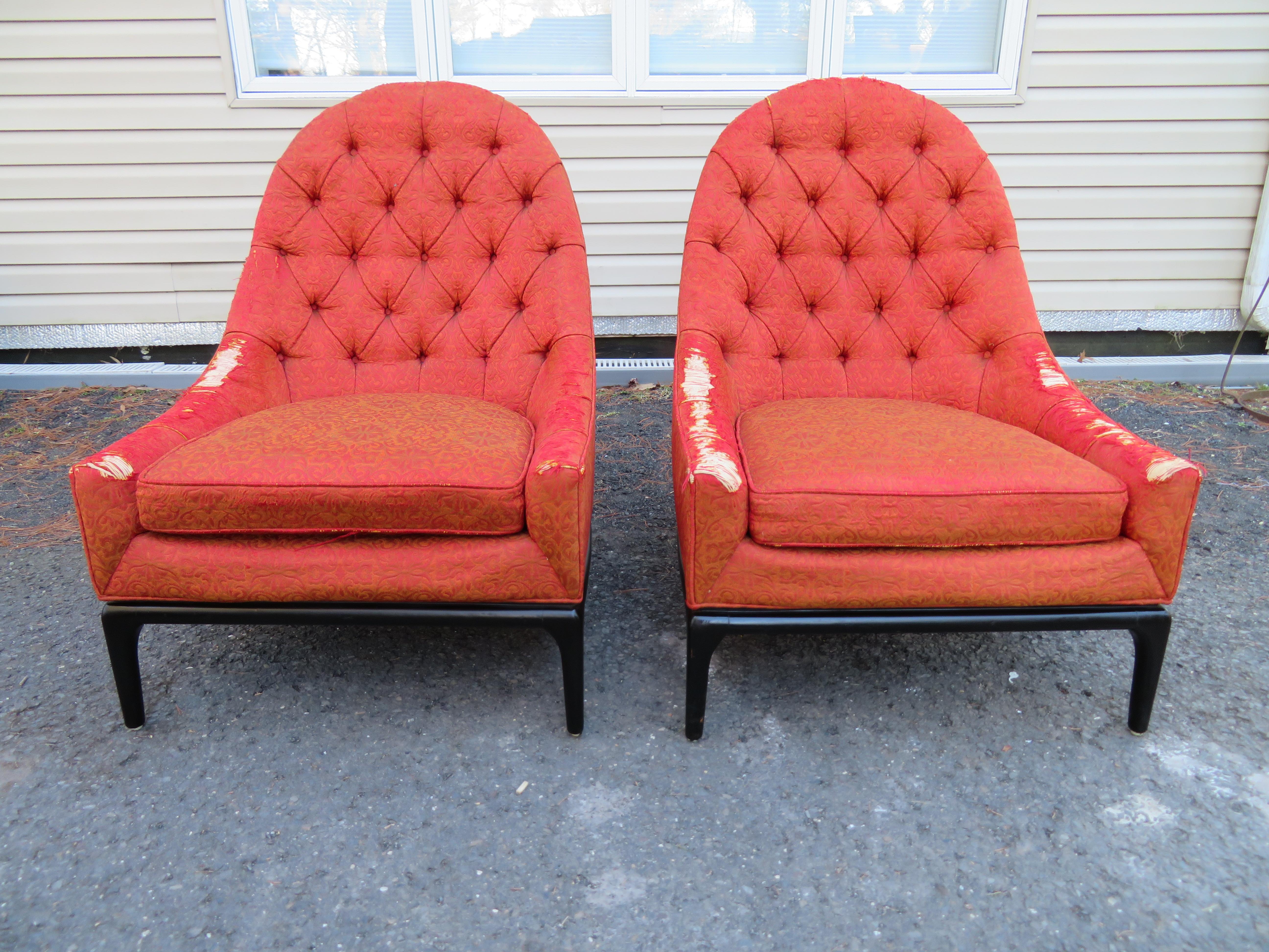 Sexy pair of Robsjohn Gibbings style tufted back slipper chairs. We love the look of the sleek tufted spoon backs resting on the well crafted ebonized frames-very sophisticated! They measure 38