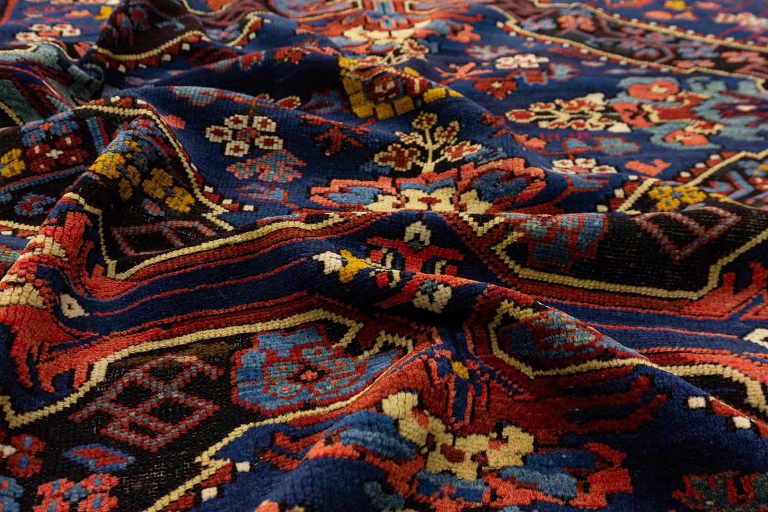 This antique Caucasian Seychour rug was woven in the northeast part of the Caucasus mountains which is in current-day Azerbaijan. This rug has no border which is a highly unique feature that is seldomly seen in antique carpets. It dates back to the