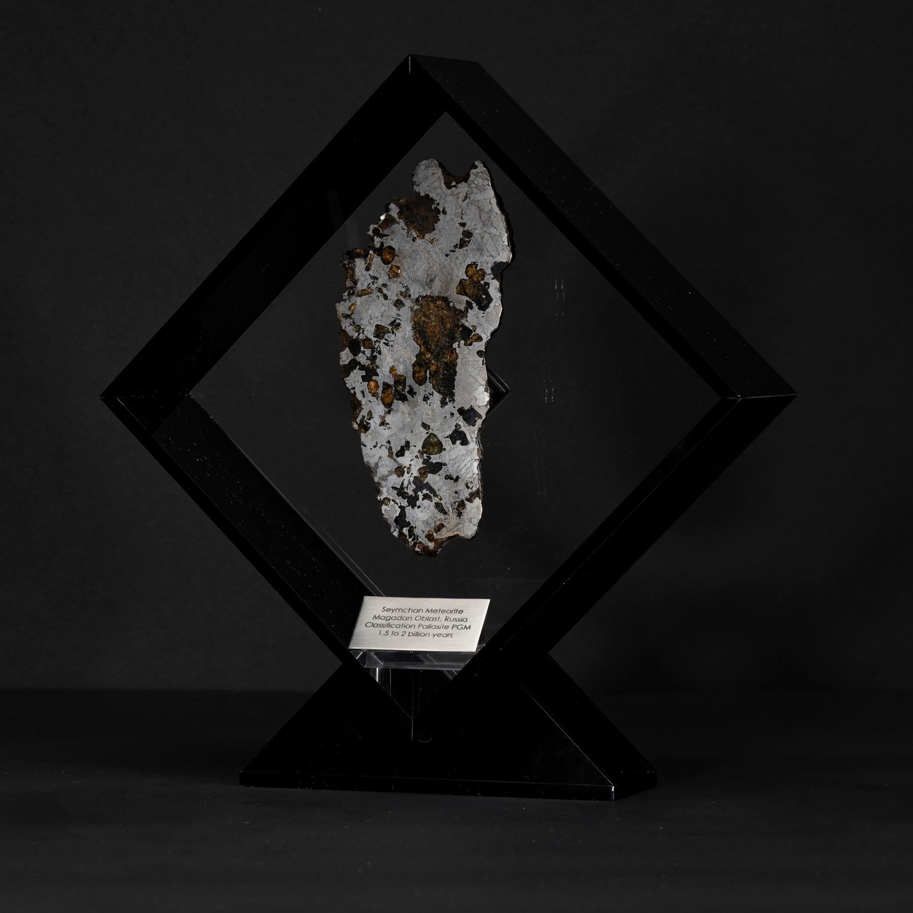 Original design in Acrylic display with a magnet making the Meteorite look as it´s floating the same way it did in outer space for years before its final visit to Earth. 

Fall: Magadanskaya Oblast, Russia.
 