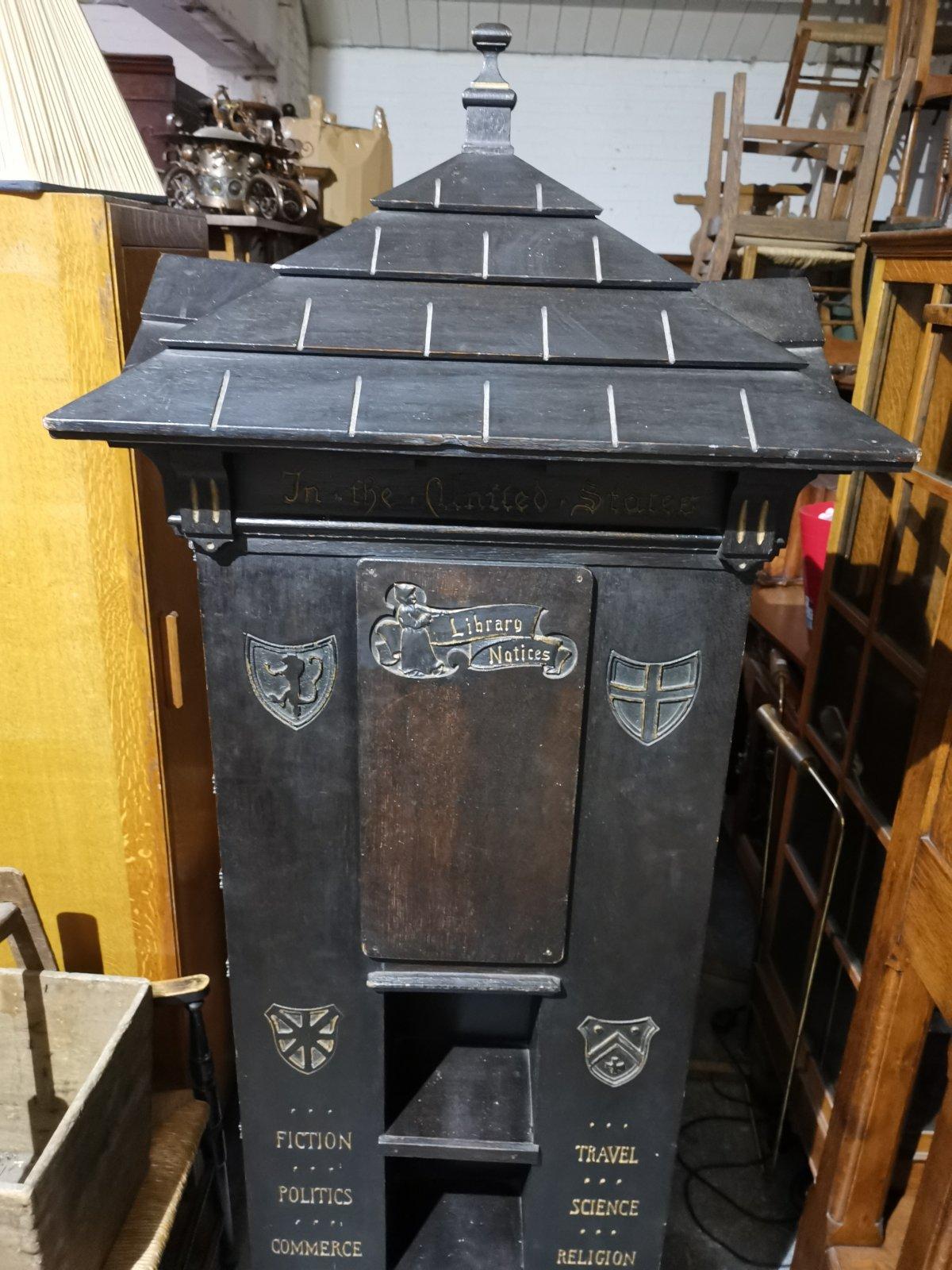 Seymour Easton (1859-1916) a rare ebonized tabard inn library revolving bookcase.
An American ebonized on oak version. Architectural form, with a wonderful tiled roof, above different compartments, and open shelves to hold books, the upper section