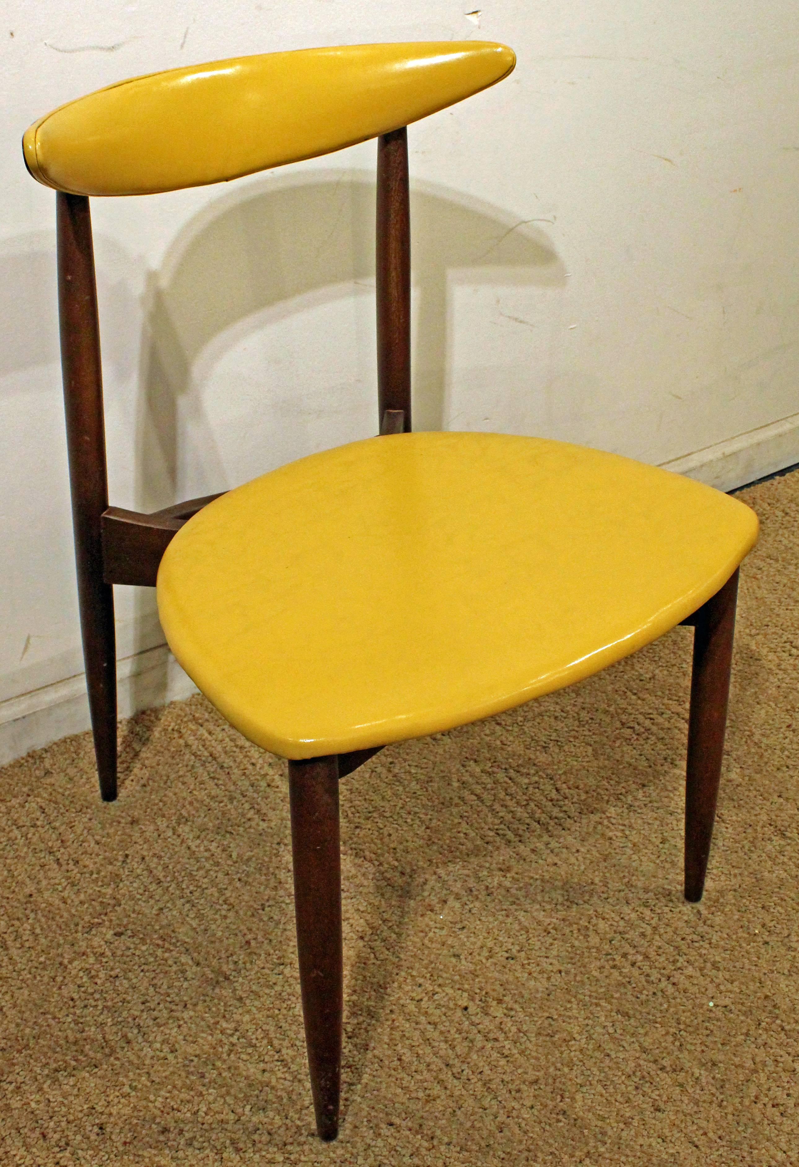 Offered is a walnut side chair designed by Seymour James Wiener for Kodawood. It is signed by Kodawood.