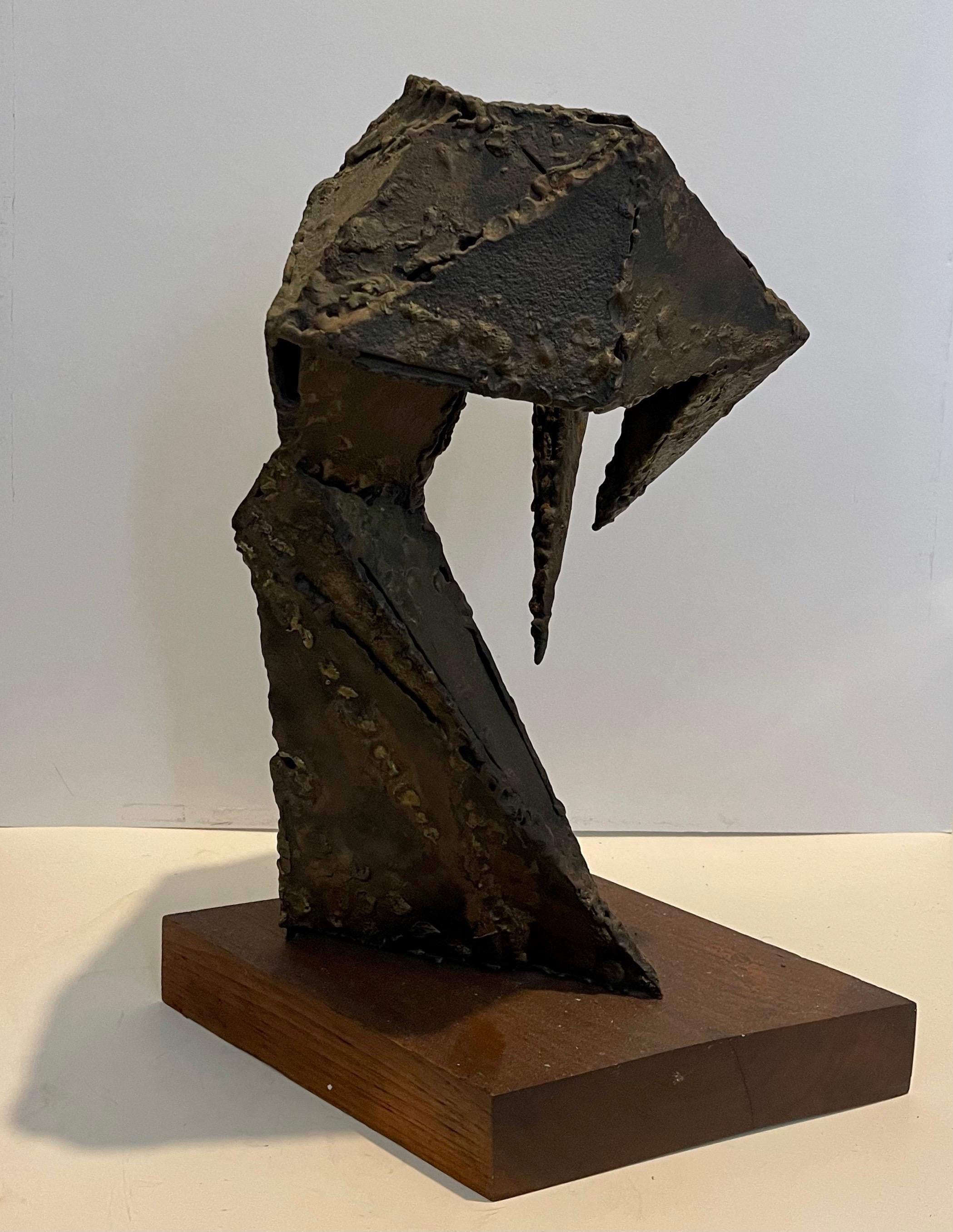 Welded, brazed sculpture on wooden base
This is not signed or dated

This work is unsigned. We were told it was the work of Seymour Lipton but as there is further documentation we are selling it as attributed and cannot guarantee it as such.

