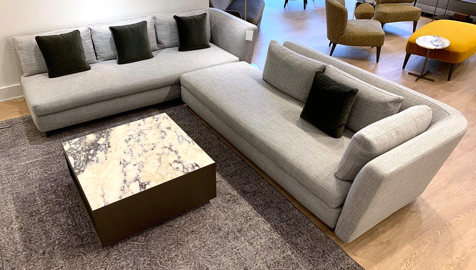 Comprised of 2 pieces, this Seymour sectional is upholstered in light gray fabric (cover removable). Includes 4 small black velvet cushions and 6 large back cushions. Designed by Rodolfo Dordoni for Minotti. Can be configured in 2 different ways.