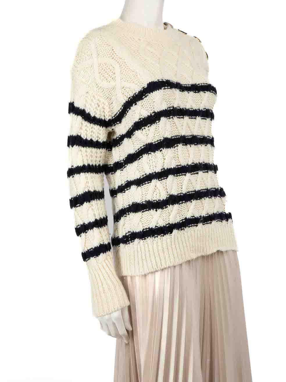 CONDITION is Very good. Minimal wear to jumper is evident. Minimal wear with light pilling to the knit on this used Sèzane designer resale item.
 
 
 
 Details
 
 
 Ecru
 
 Merino wool
 
 Knit jumper
 
 Navy striped pattern
 
 Long sleeves
 
 Round