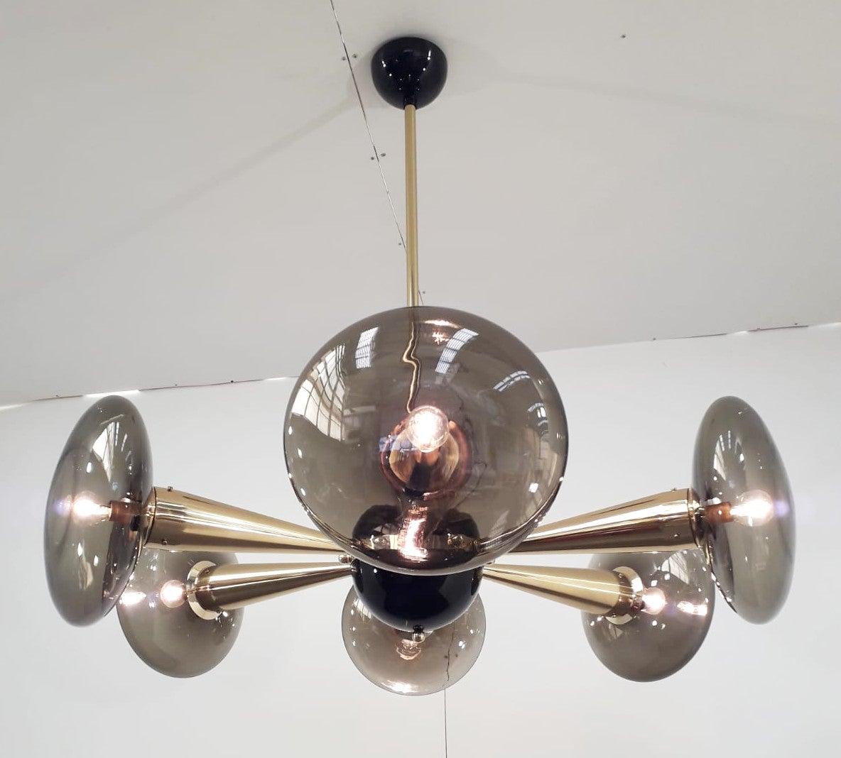 Italian chandelier with smoky Murano glass shades, mounted on newly made polished brass frame with black enameled center and ceiling canopy / Designed by Fabio Bergomi for Fabio Ltd / Made in Italy
6 lights / E12 or E14 type / max 40W each
Measures: