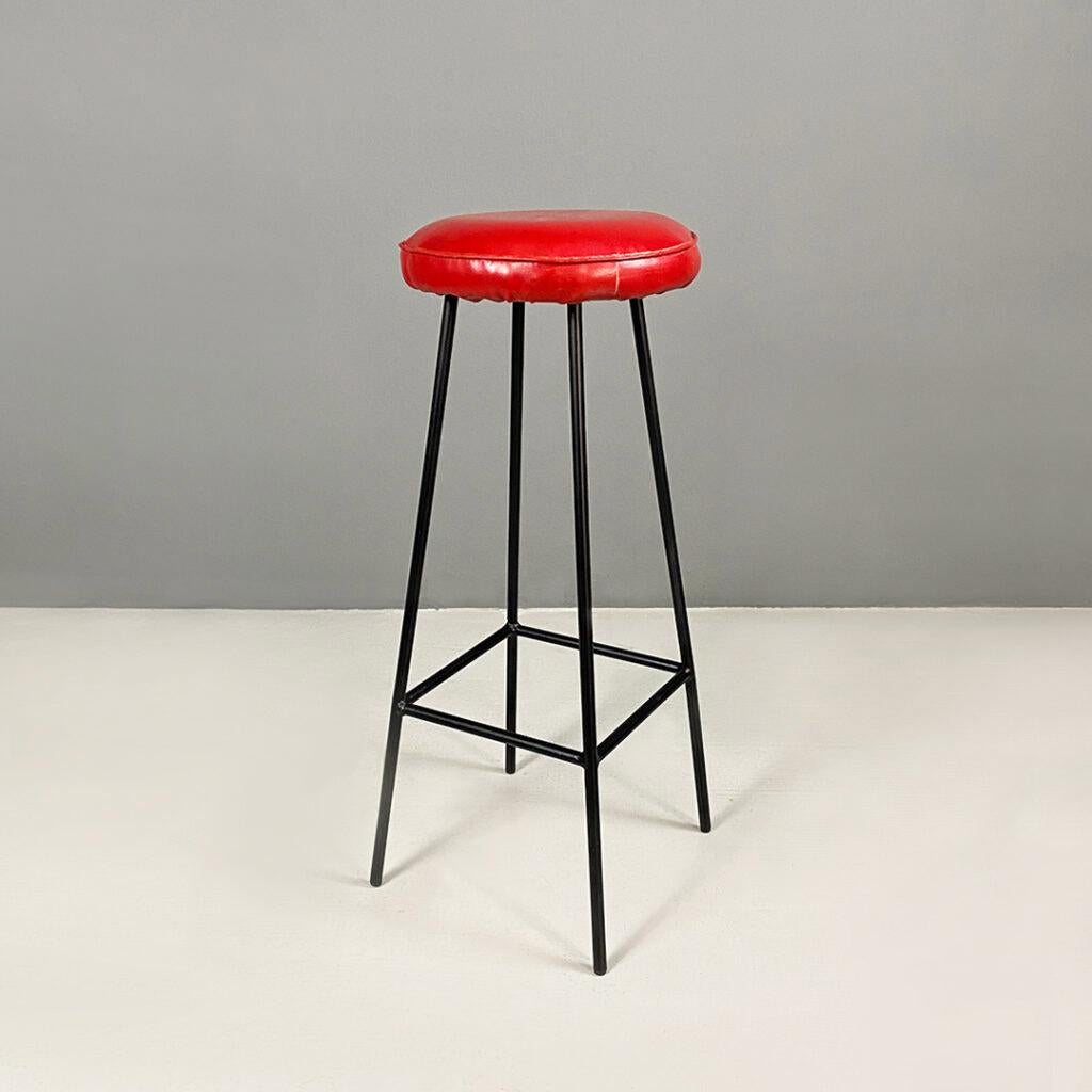 Set of three stools with matte black painted metal rod frame and round shaped seats upholstered and covered in their original sky in three colors: beige, red and blue
1960 ca.
Good overall condition.
Measurements in cm 35x35x83h
A trio of very fun