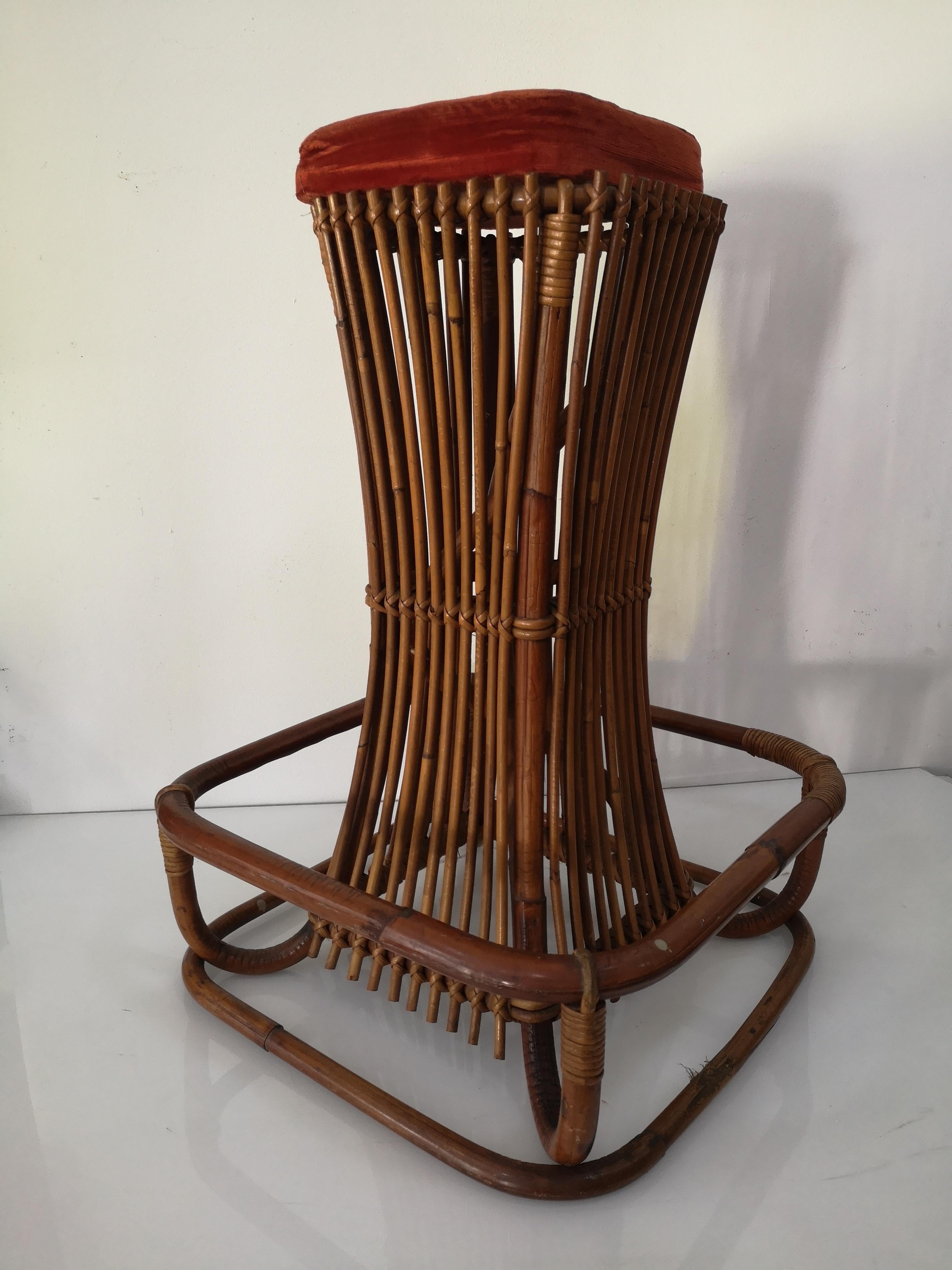 Rattan bar stool handmade by Tito Agnoli for Bonacina in the 1960s.
The stool is in very good condition as seen in photos.
The seat upholstery is Bordeaux in color.

The stool measures:
Height   cm 76
Width  cm 50
Depth  cm 50

Careful Shipping