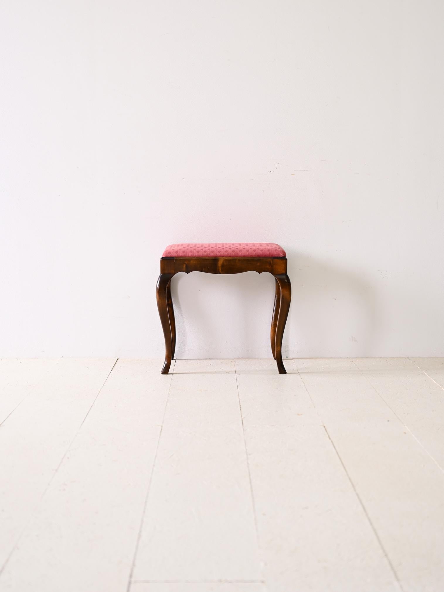 1960s stool with red fabric.

The slightly dark-colored wooden frame gives the piece a warm feel, while the red fabric seat adds a contemporary accent.

Good condition, conservative restoration with products of natural origin has been carried out.